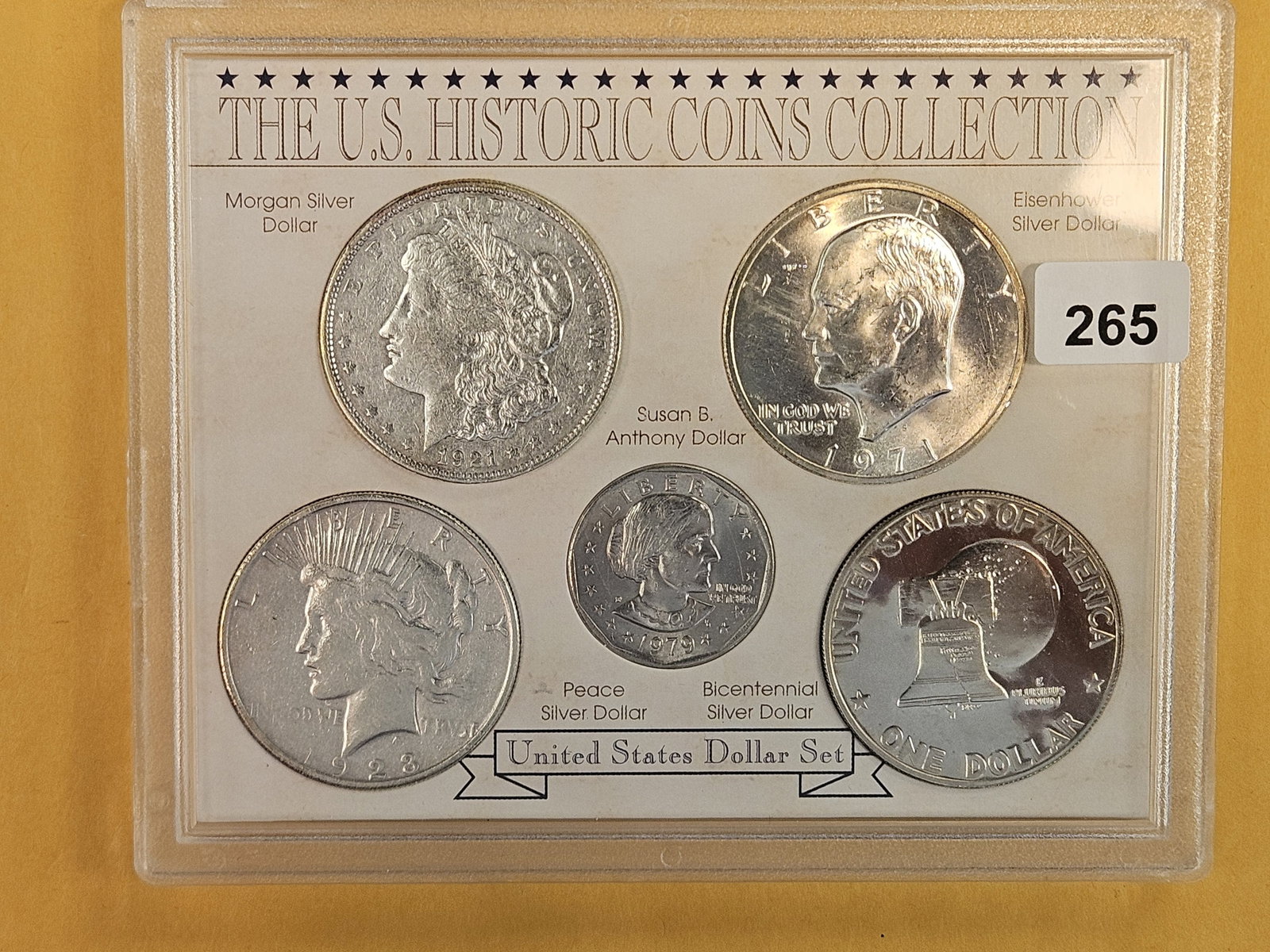 Four Silver Dollar Collection: Five total dollars. Four are silver