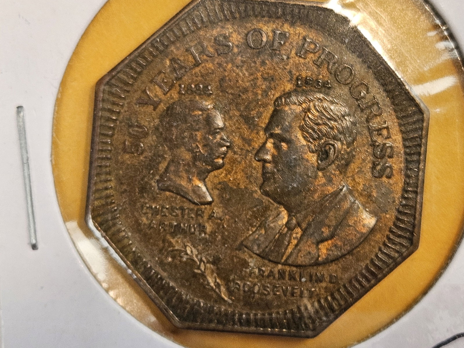 Scarce 50 years of Progress token: Arthur and Roosevelt