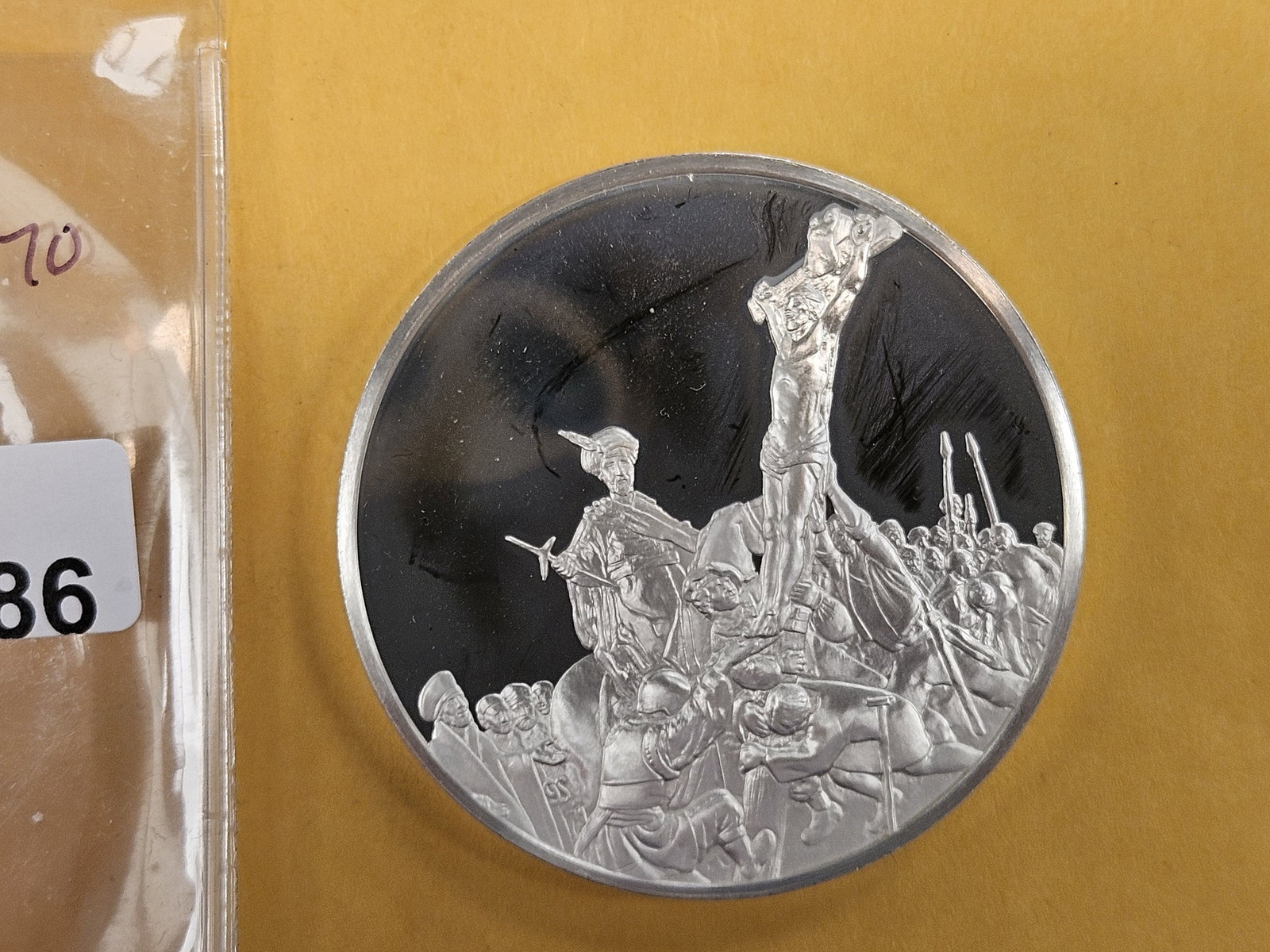 GEM Proof Deep Cameo Sterling Silver Rembrandt round: Weighs 66 grams. 2.13 troy ounces. The Raising of the Cross