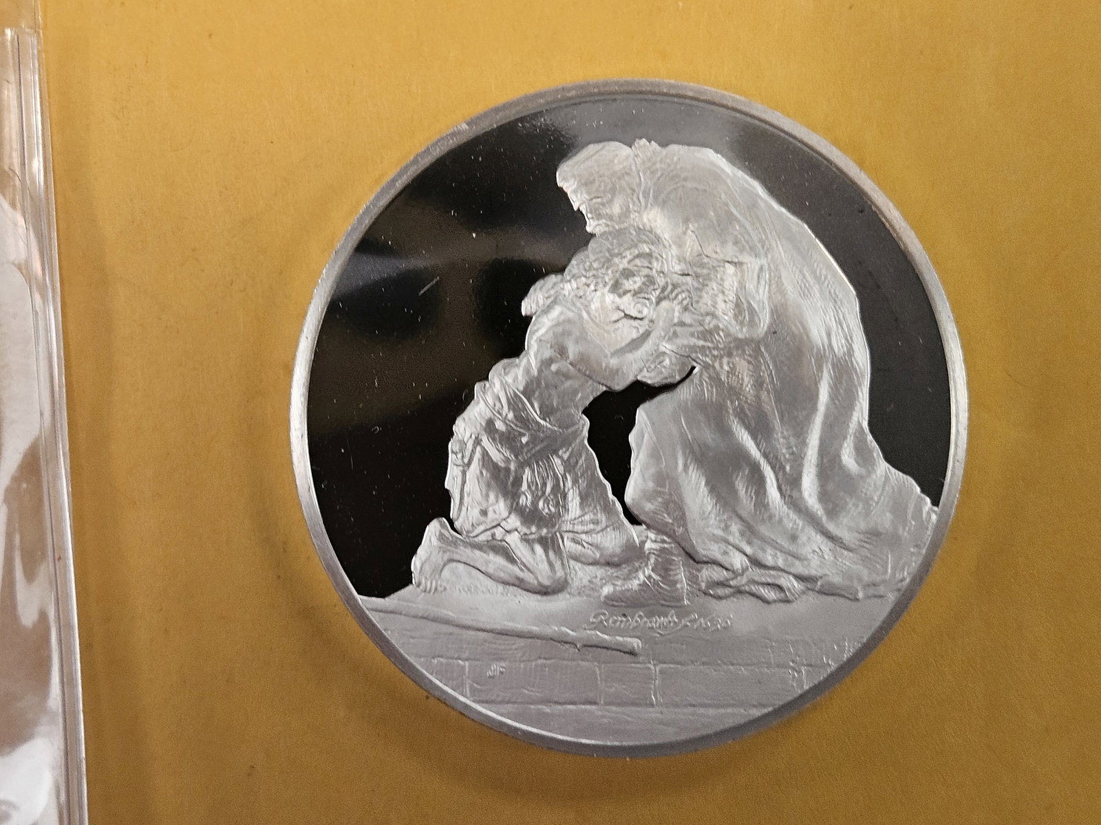 GEM Proof Deep Cameo Sterling Silver Rembrandt round: Weighs 66 grams. 2.13 troy ounces. Return of the Prodigal Son