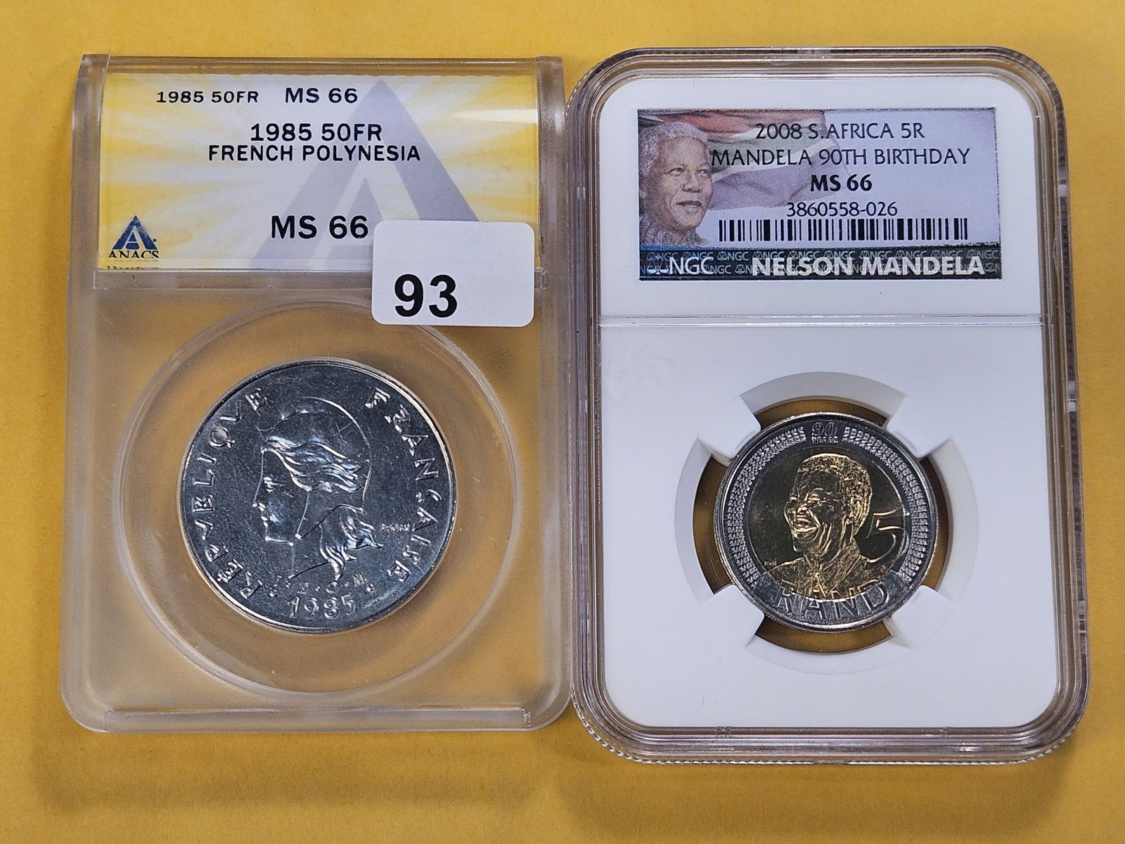 NGC and ANACS Graded Foreign Coins in Mint State 66: NGC 2008 South Africa 5 Rand and ANACS 1985 Polynesia 50 Francs in Mint State 66