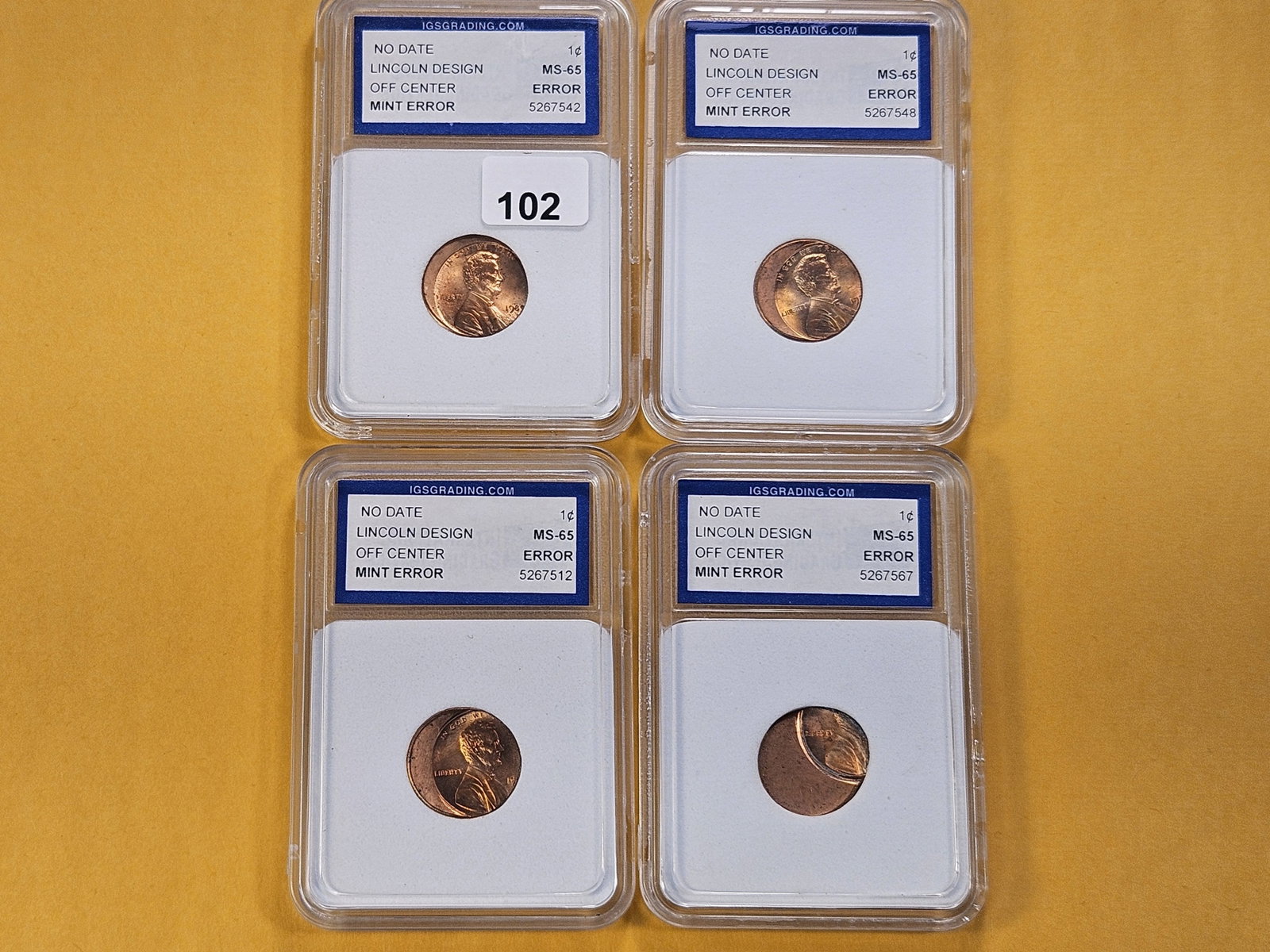 MINT ERRORS! Four IGS Slabbed Brilliant Uncirculated Lincoln Memorial Cents with Mint Errors: Off Center Strikes! No Dates