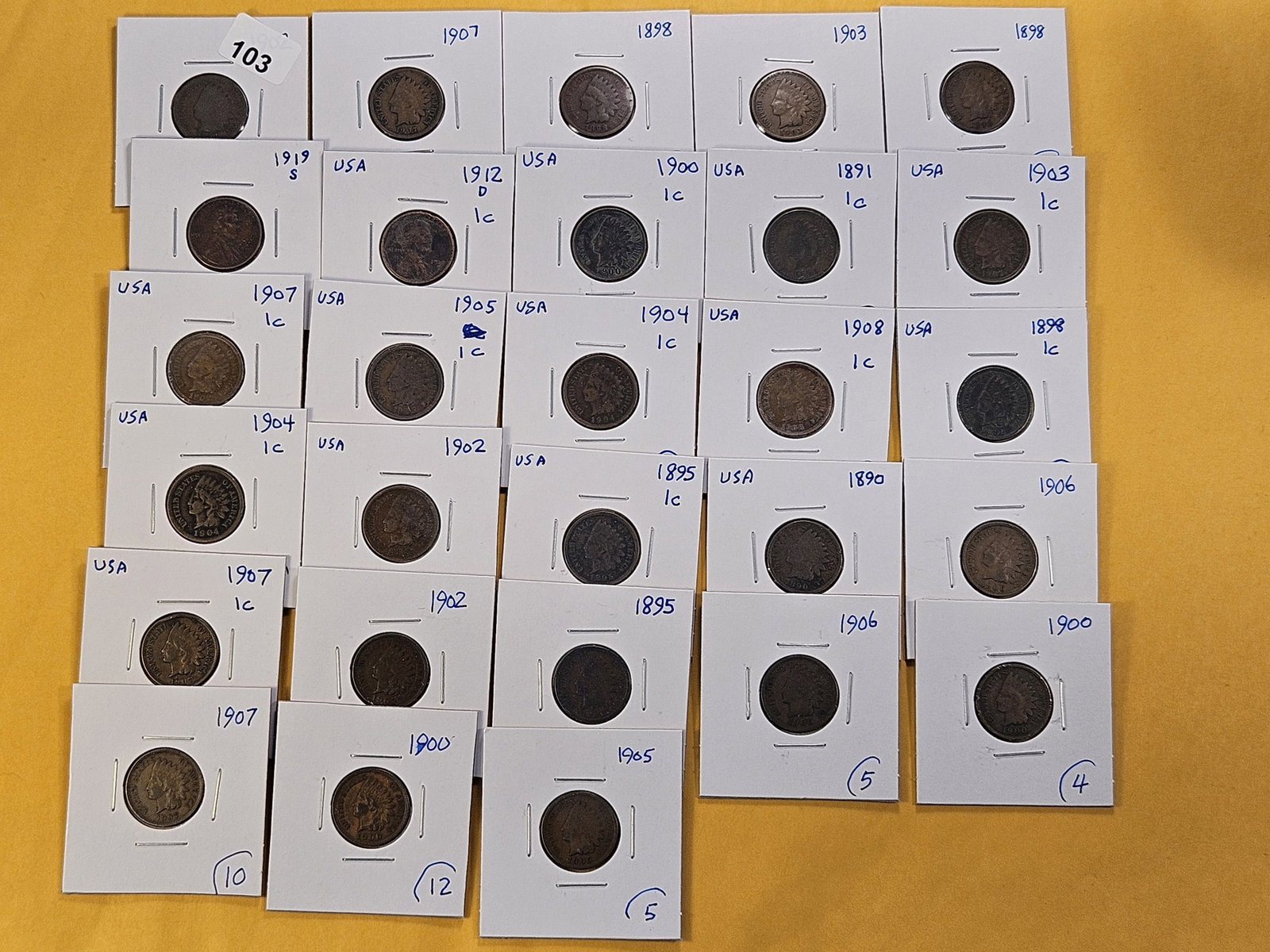 Twenty-Eight Circulated Mixed US Cents: Twenty-six Indian Head Cents with 1912-D and 1919-S Wheat Cents
