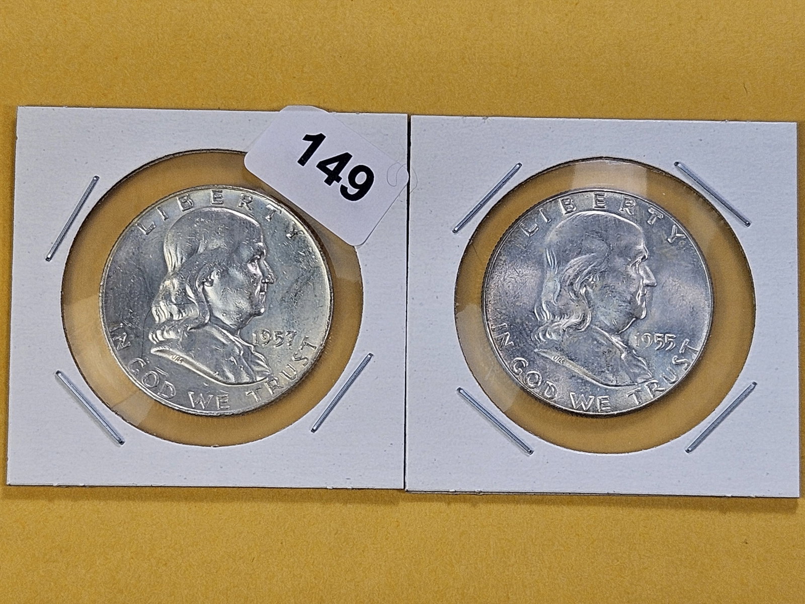 Two Uncirculated Franklin Silver Half Dollars: 1955 and 1957-D