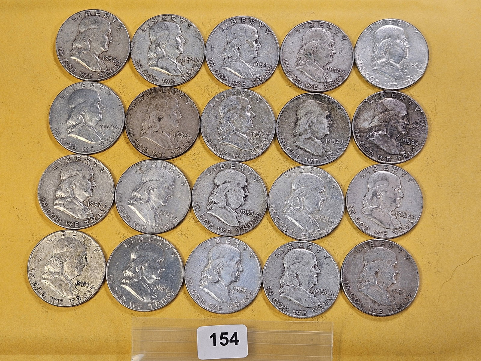 Twenty Circulated Franklin Silver Half Dollars: Mixed Dates and Grades