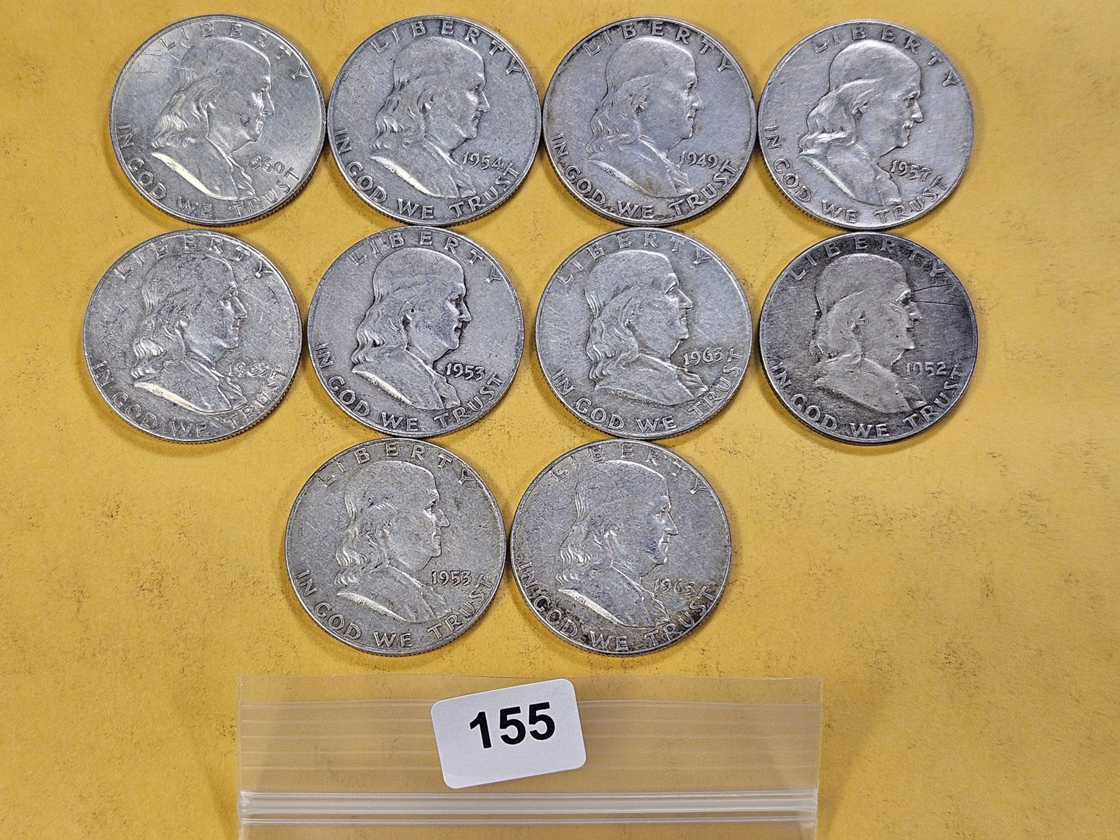 Ten Circulated Franklin Silver Half Dollars: Assorted Dates and Grades