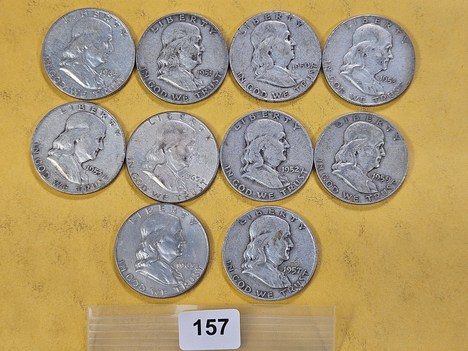Ten Circulated Franklin Silver Half Dollars: Assorted Dates and Grades