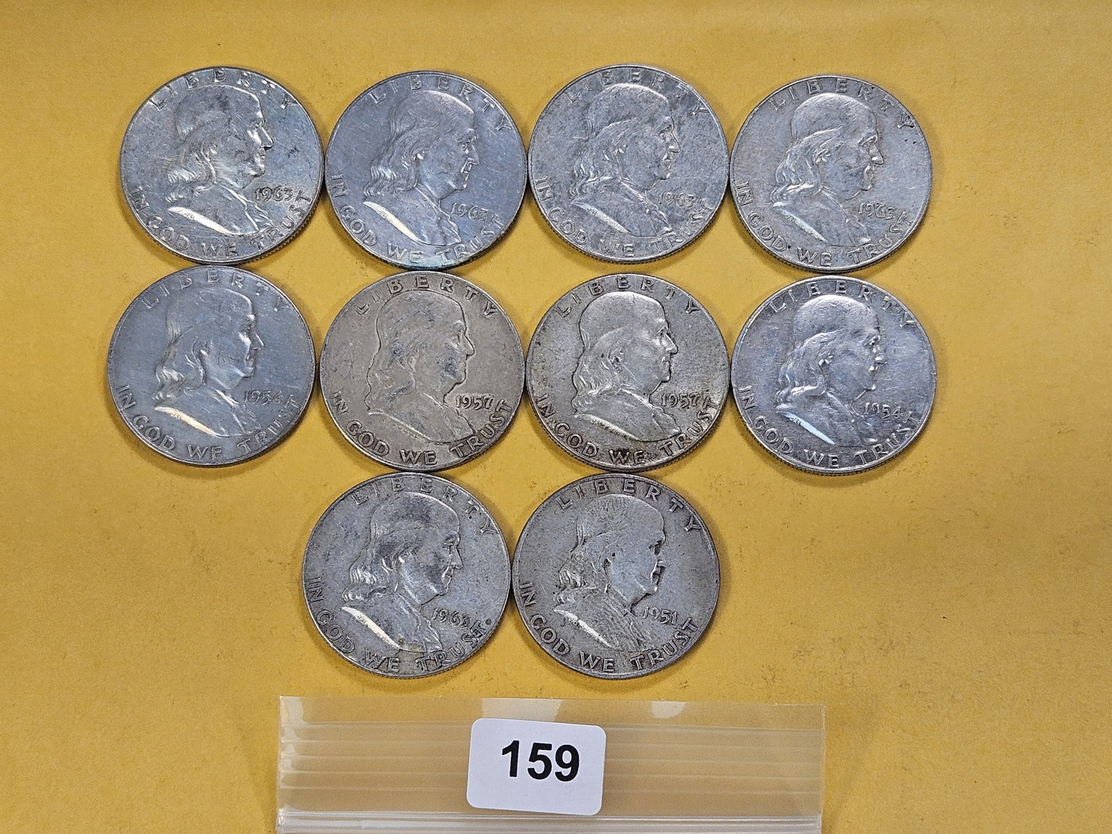 Ten Circulated Franklin Silver Half Dollars: Assorted Dates and Grades