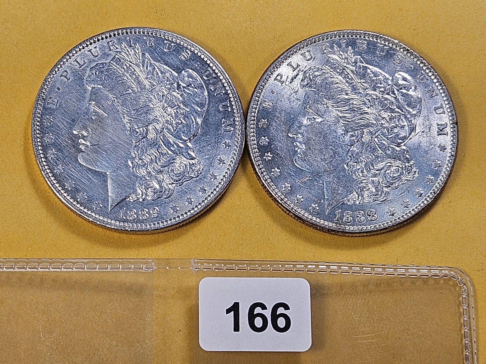 Two About Uncirculated Morgan Silver Dollars (1 of 4)
