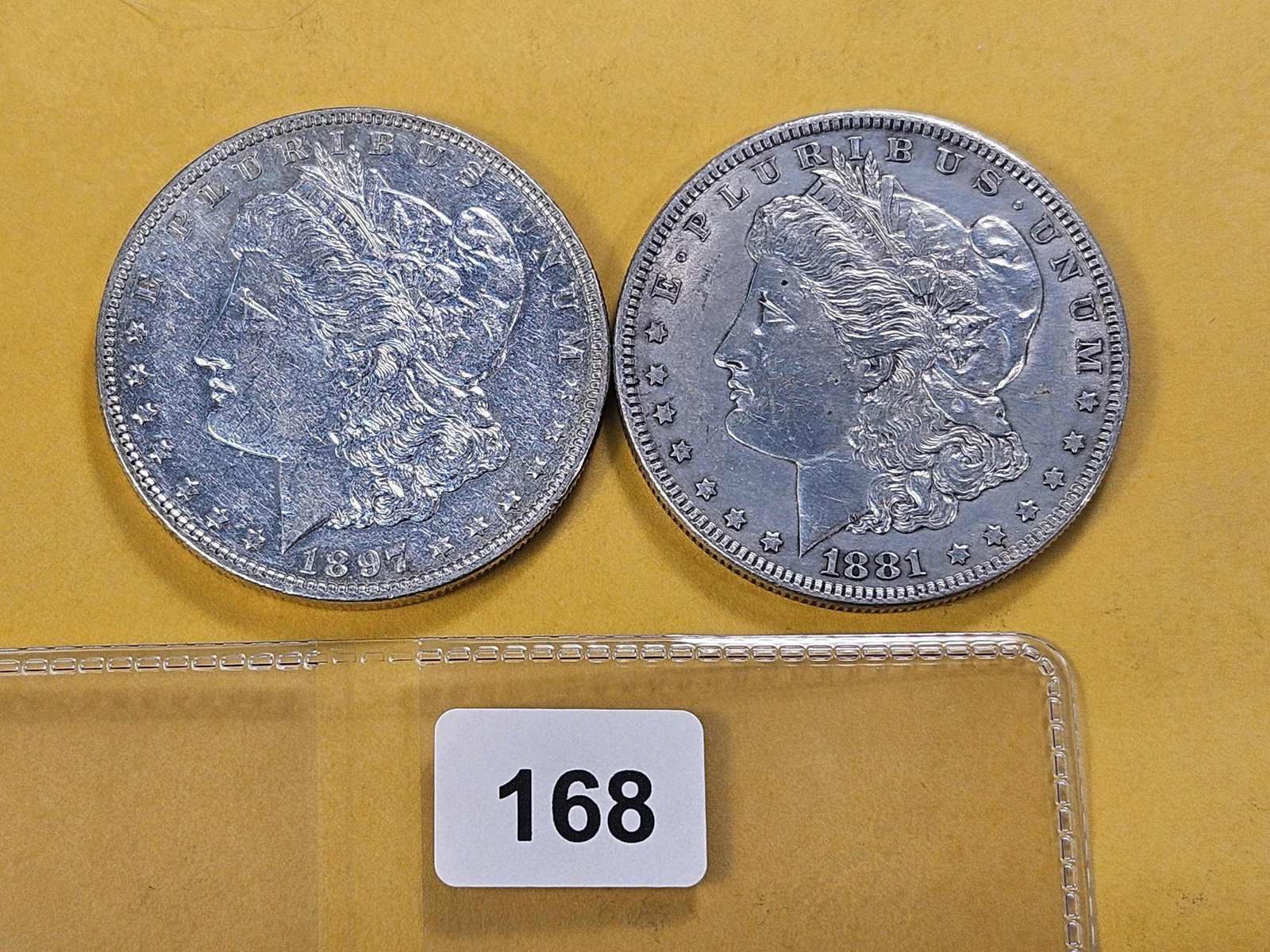 Two About Uncirculated Morgan Silver Dollars: 1881 and 1897