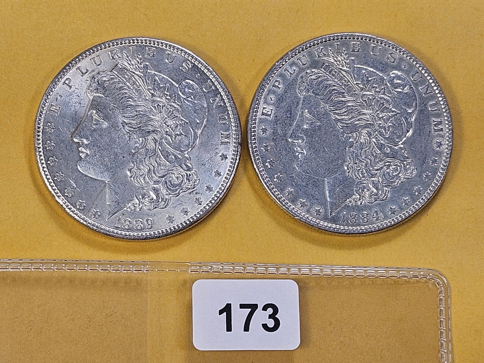 Two About Uncirculated Morgan Silver Dollars (1 of 4)