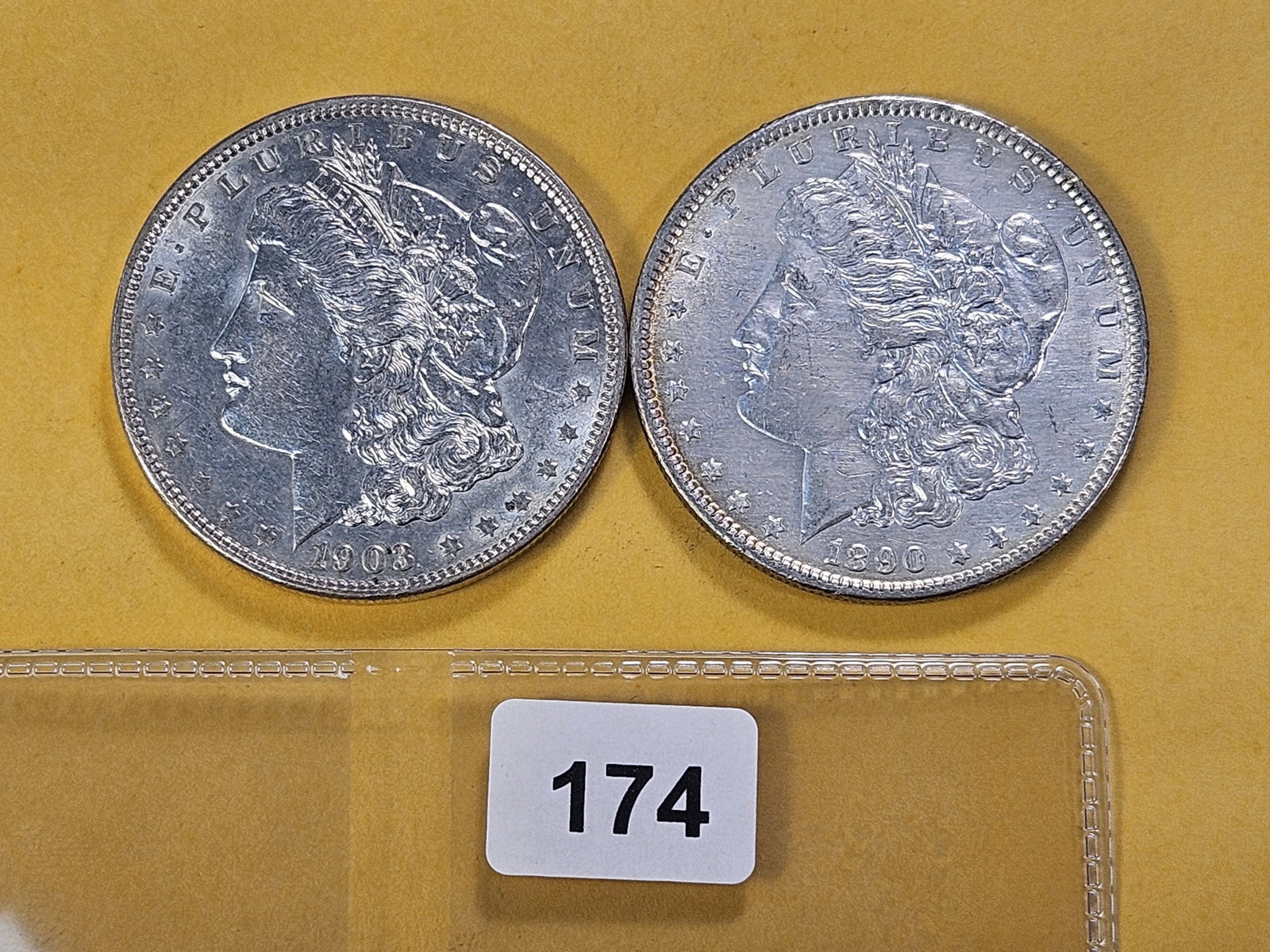 Two About Uncirculated Morgan Silver Dollars: 1890 and 1903
