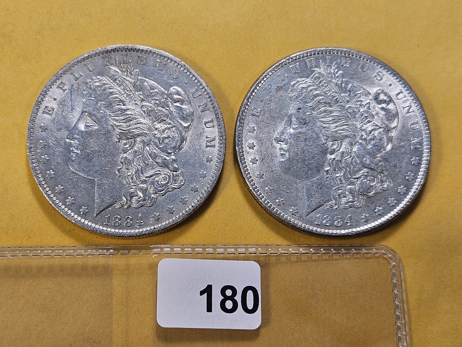 Two About Uncirculated Morgan Silver Dollars: 1884 and 1884-O