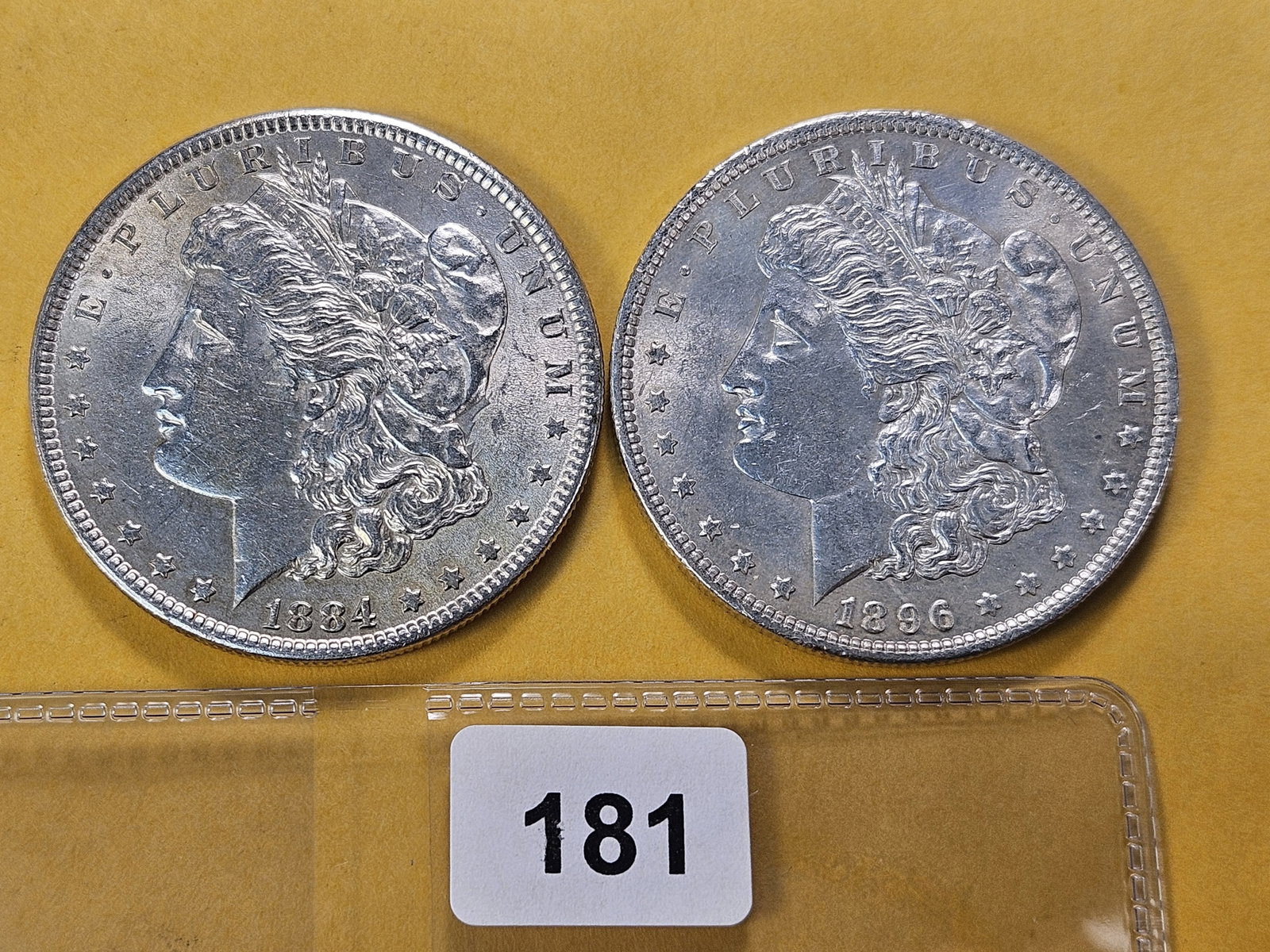 Two About Uncirculated Morgan Silver Dollars: 1884 and 1896