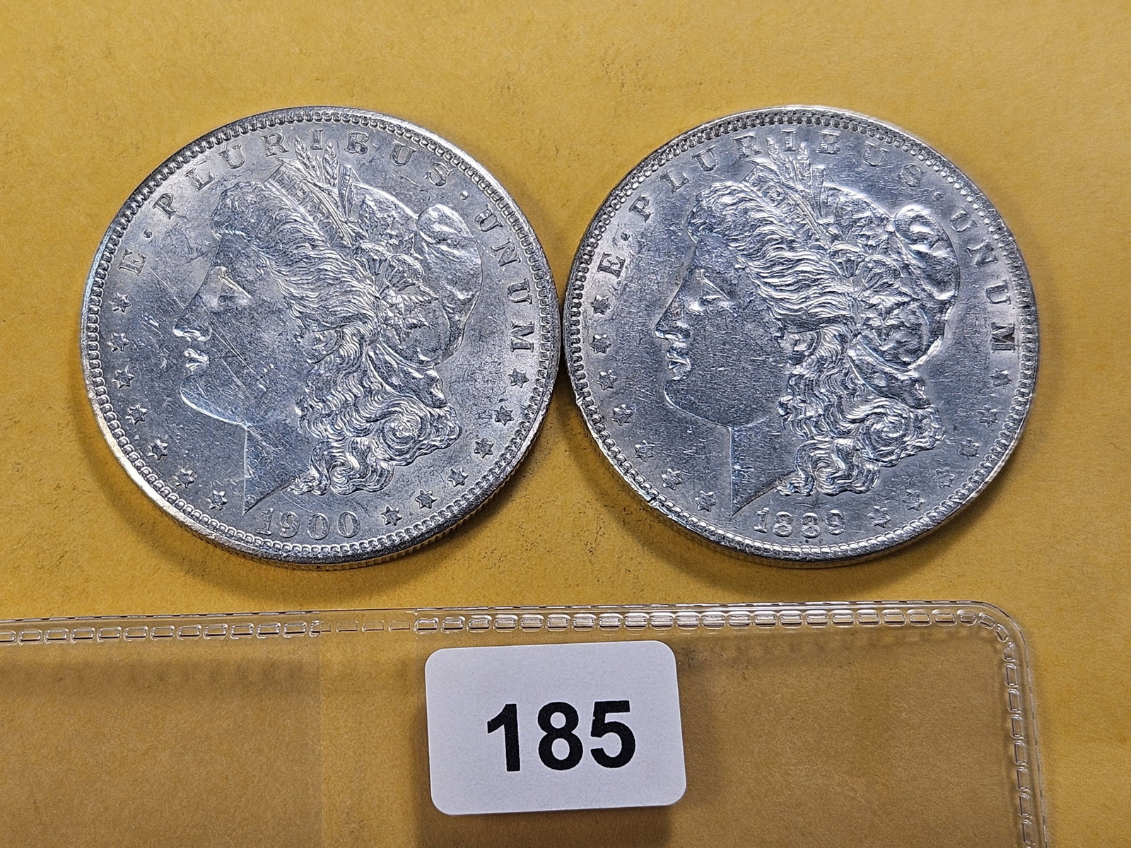 Two About Uncirculated Morgan Silver Dollars (1 of 4)
