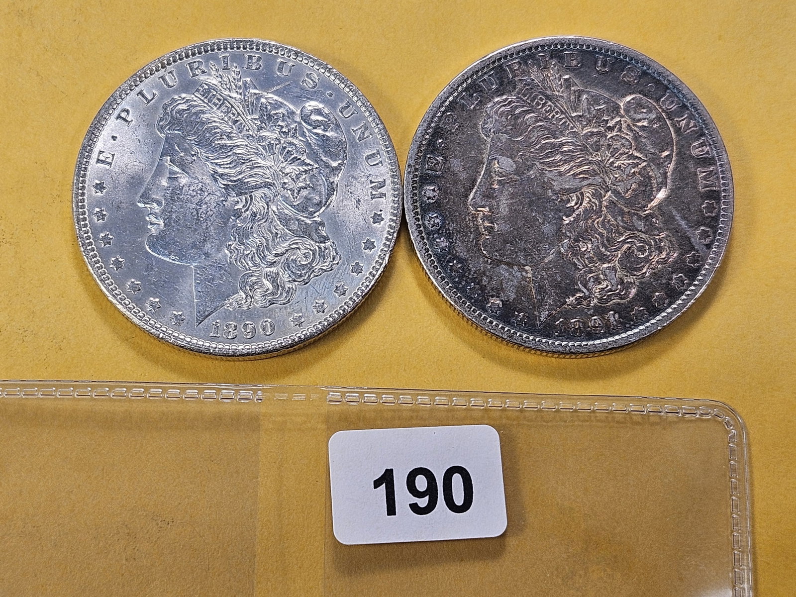 Two About Uncirculated Morgan Silver Dollars: 1890 and 1891-O