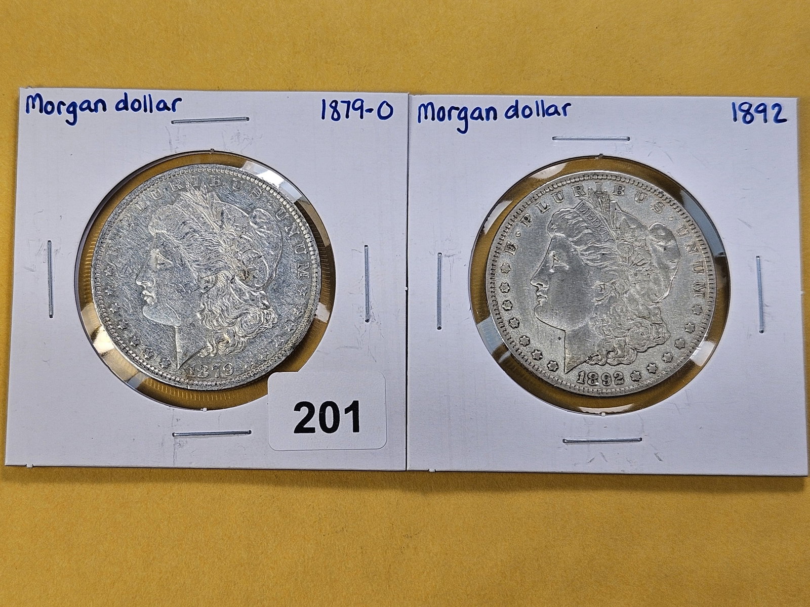 Two Better Date Morgan Silver Dollars: 1879-O and 1892