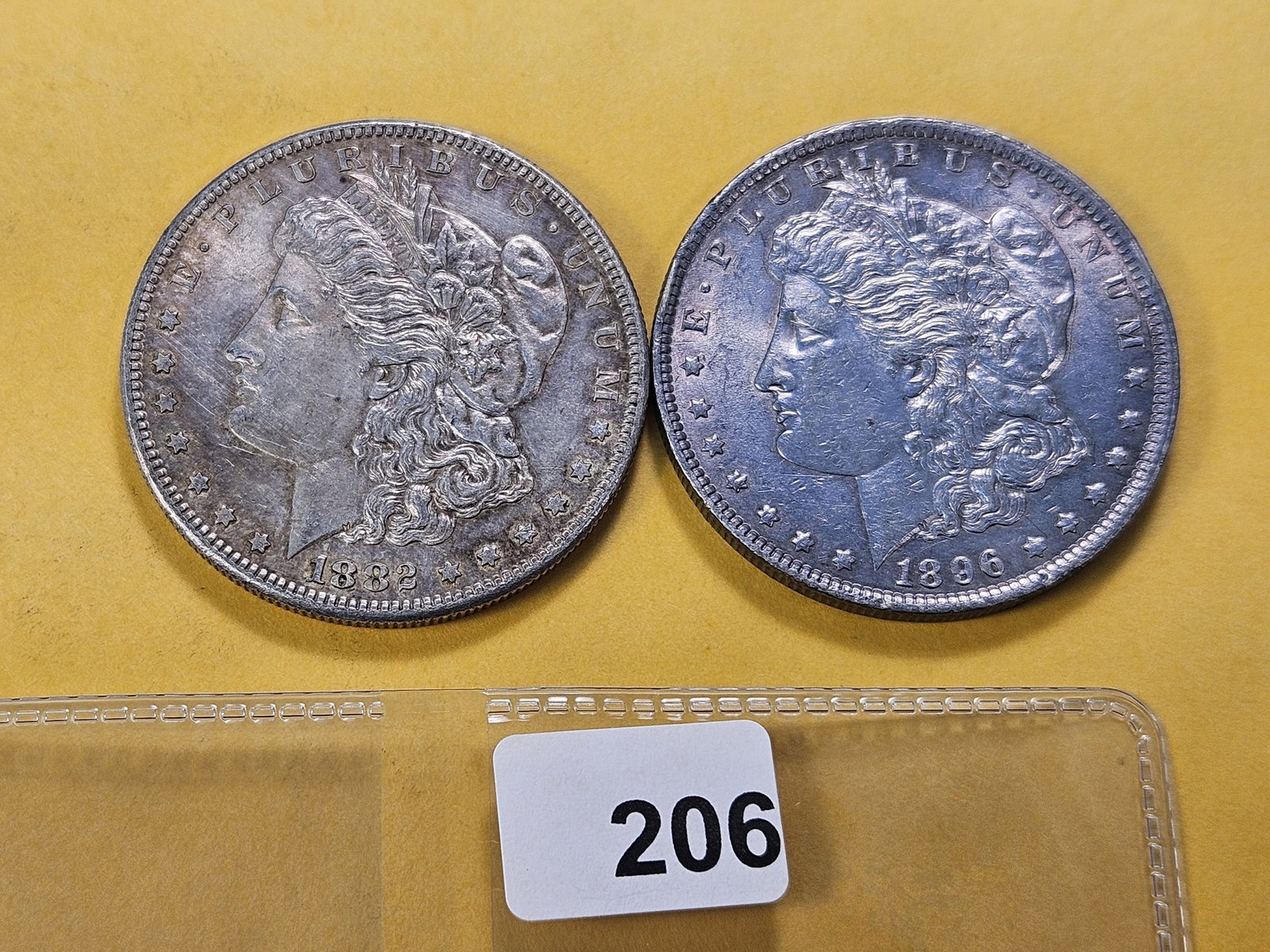 Two About Uncirculated Morgan Silver Dollars (1 of 4)