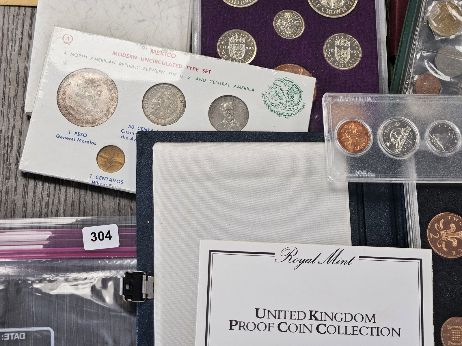 Eleven Foreign Mint Sets, one is Silver - 3