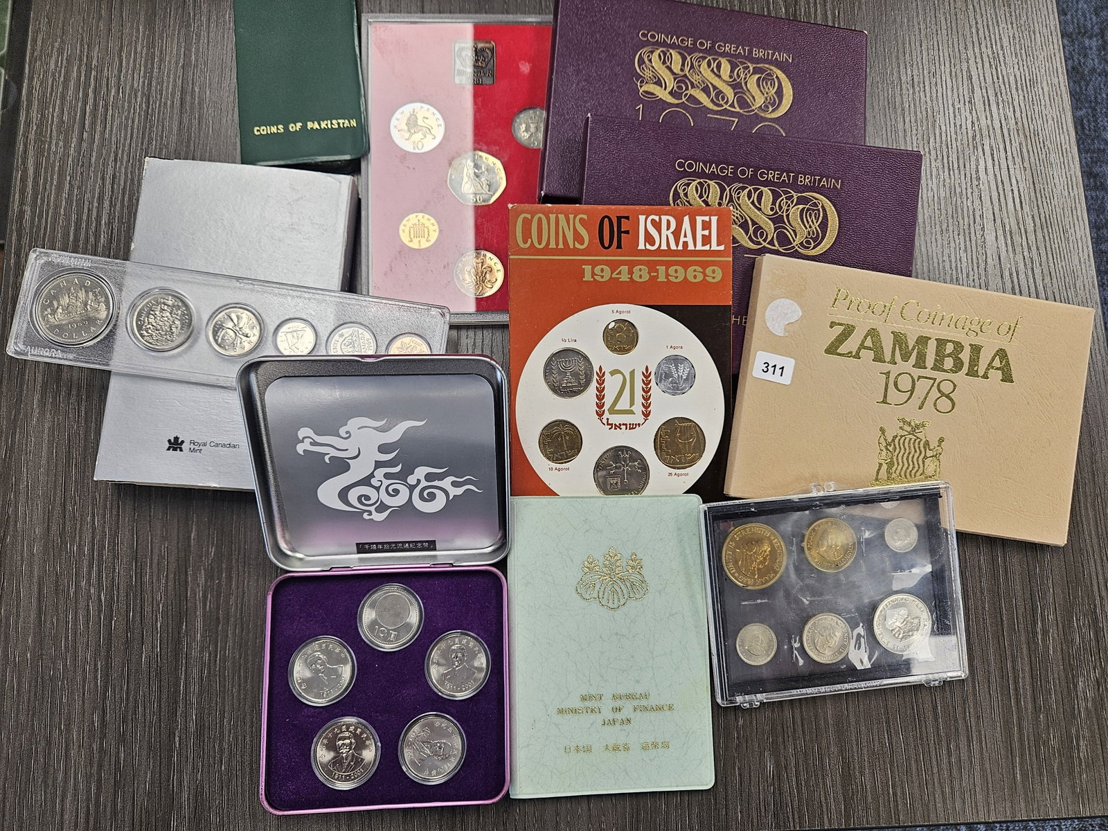 Eleven Foreign Mint Sets: From all over the world! Including Isreal, Zambia, Canada, Ireland and more!