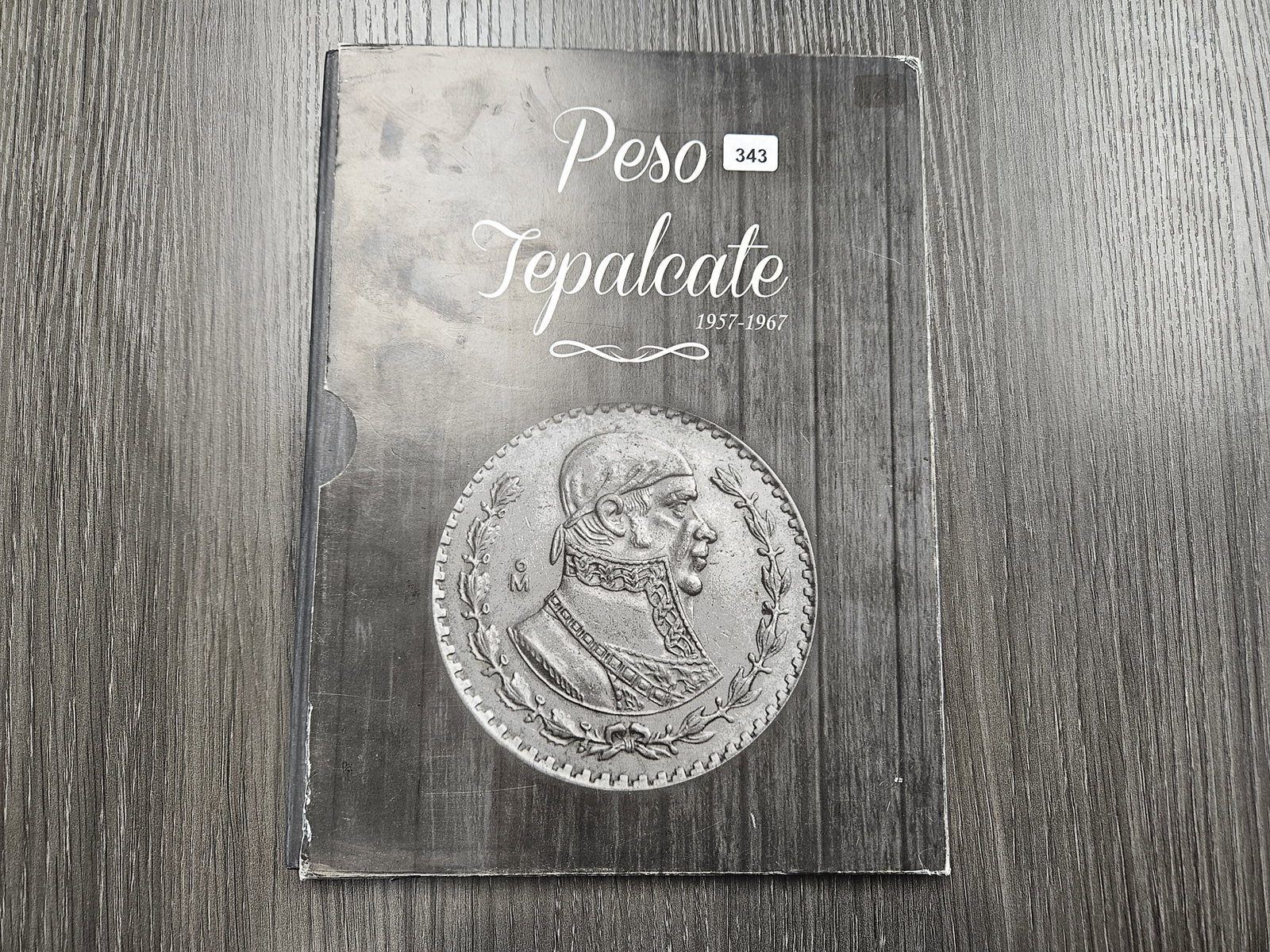 Almost Completed Mexican Silver Peso Book: Twelve Silver Pesos! 1957-1967. Missing the 1957 Commemorative Peso