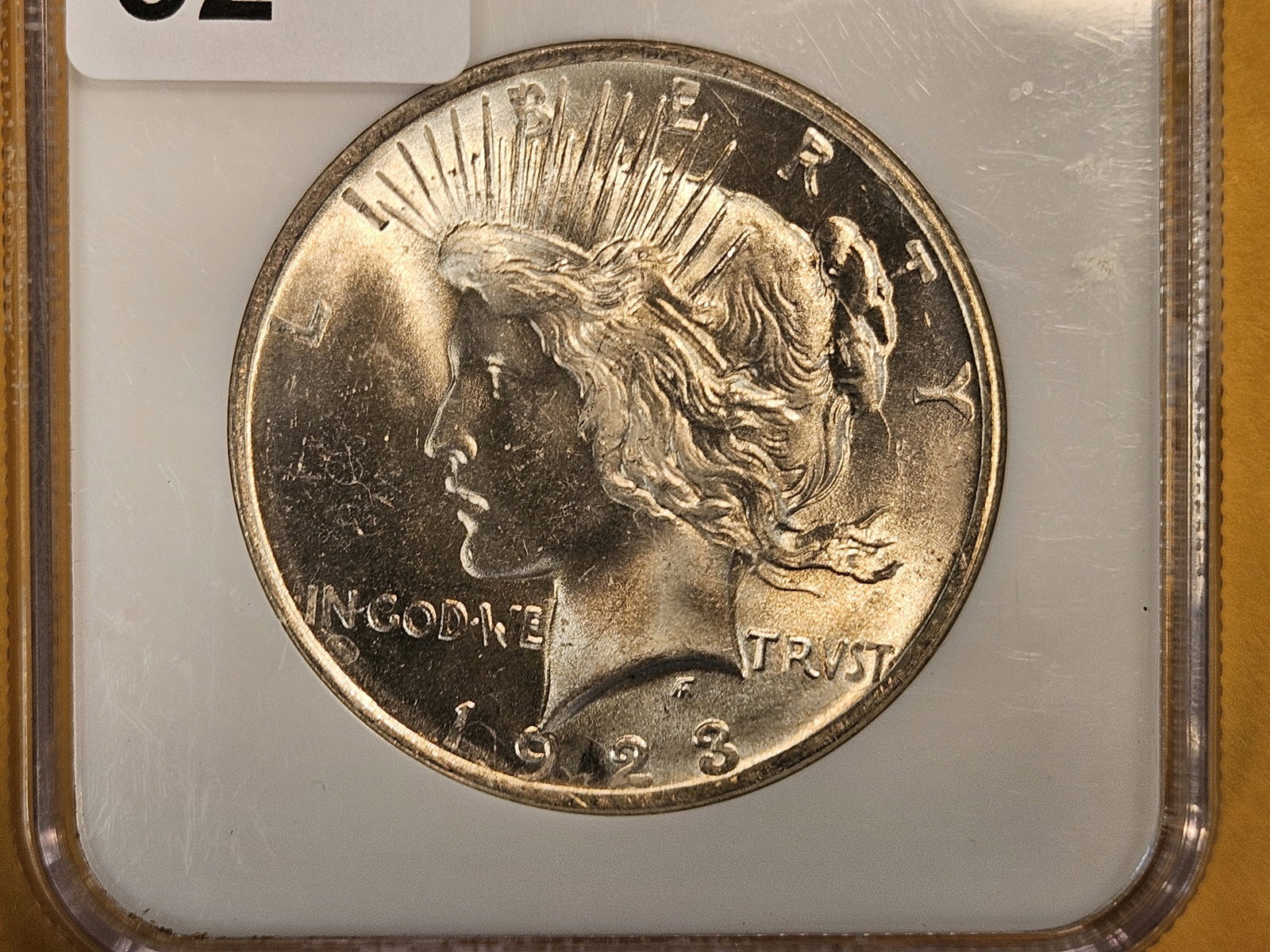 GEM! 1923 Peace Silver Dollar in Mint State 65: Superior for the grade. CAC Green Bean sticker!