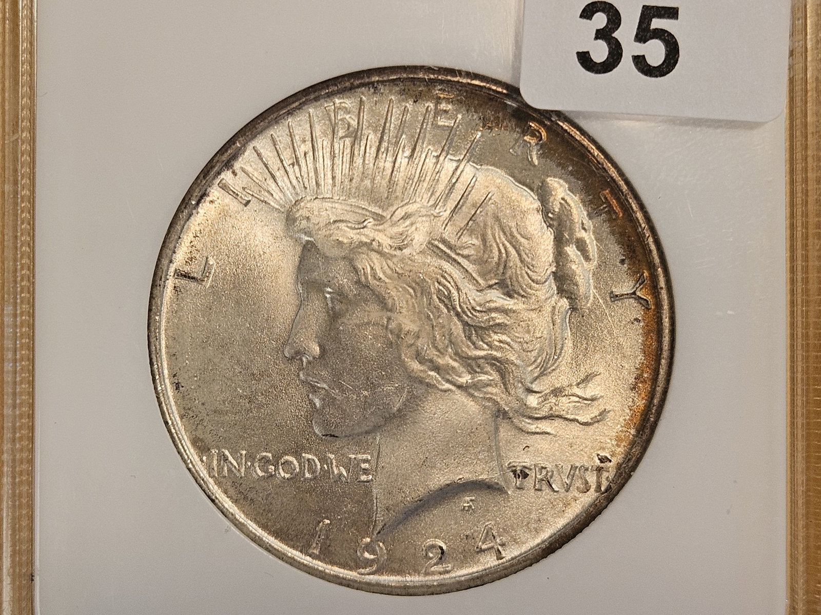 GEM! NGC 1924 Peace Silver Dollar in Mint State 65: Housed in an old Fatty holder! Purty toning!