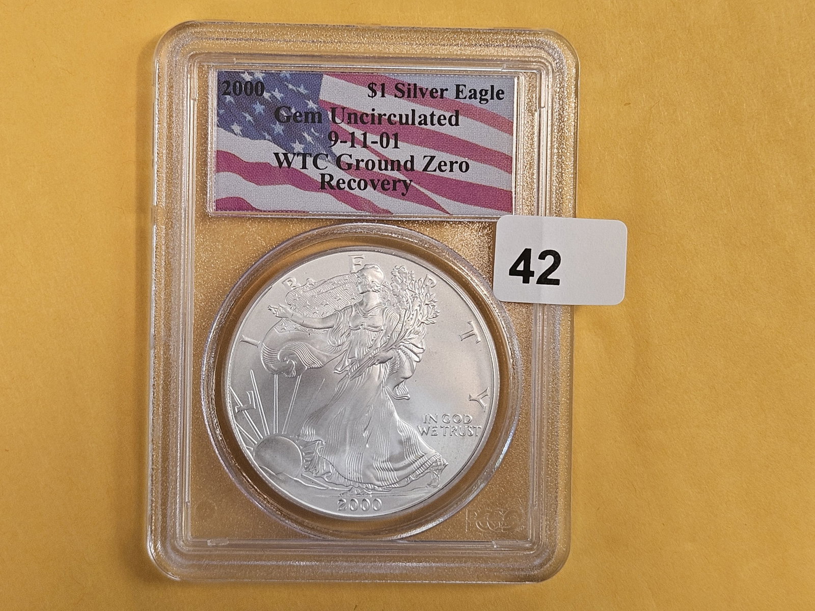 WORLD TRADE CENTER Recovered American Silver Eagle!!: PCGS 2000 ASE in GEM Uncirculated. 9-11-01. Ground Zero Recovery coin. Where were you?