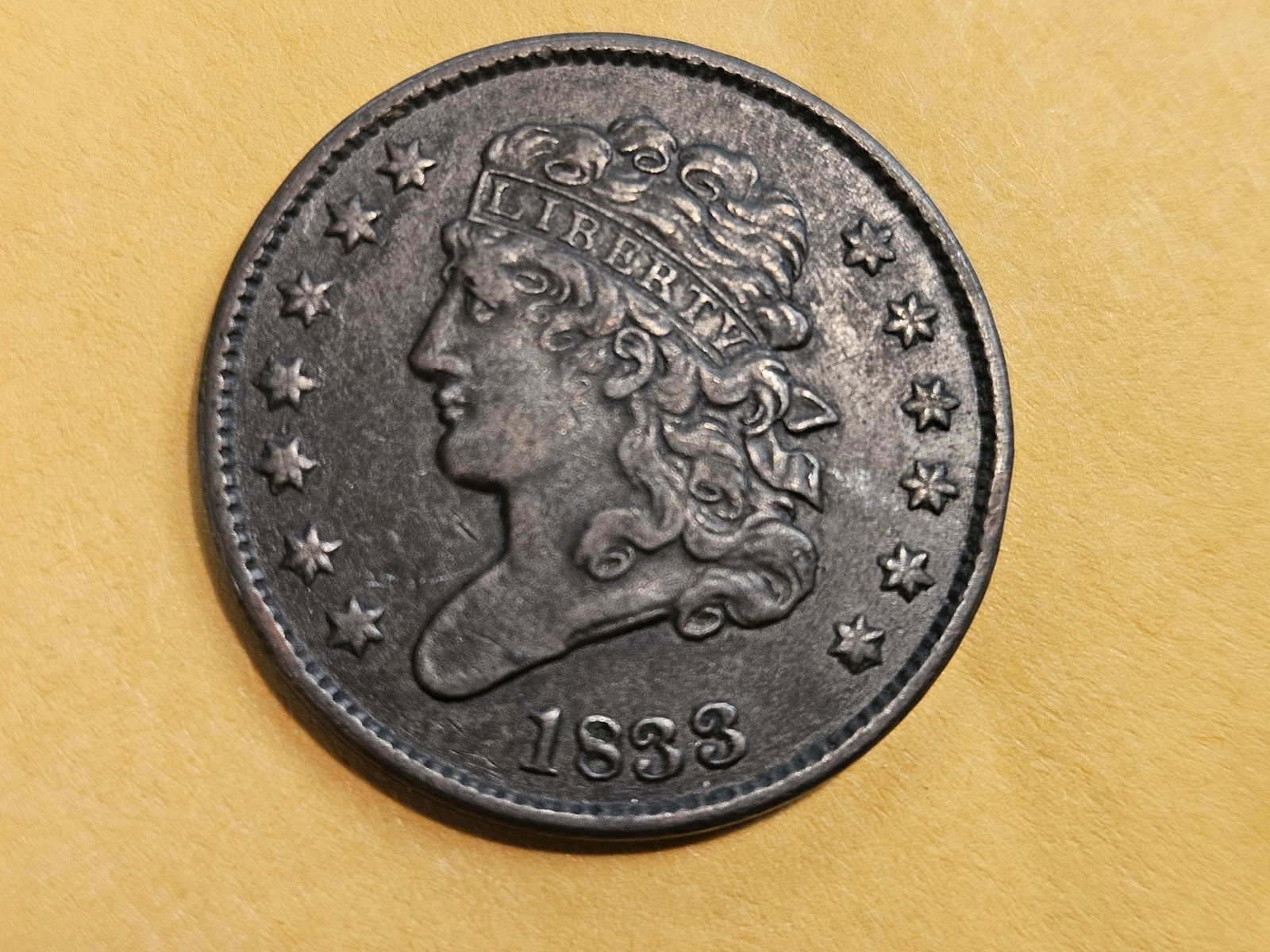 1833 Classic Head Half Cent in Extra Fine: Light hints of original luster