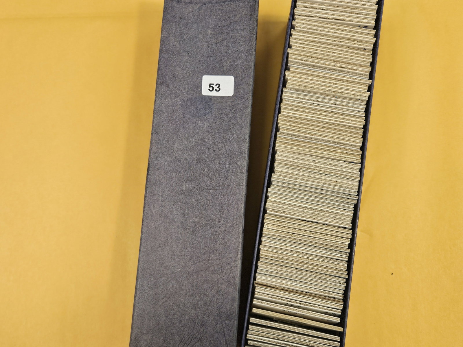 Stock box with about 50 wheat cents: All in 2x2's. Probably all common. Some uncirculated. Unchecked by us.