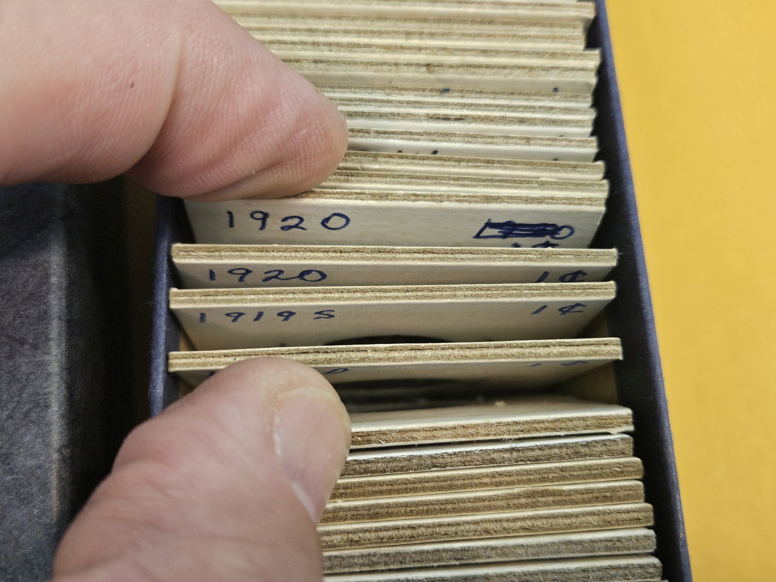 Stock box with about 50 wheat cents - 4