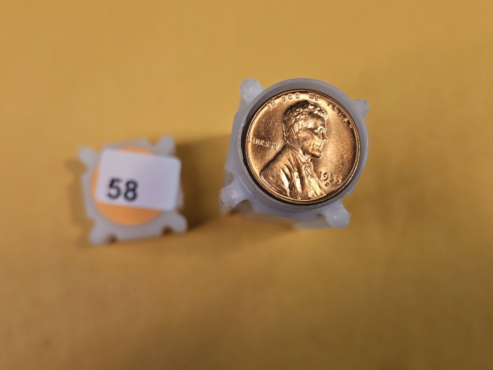 Brilliant Uncirculated Roll of 1955-D Wheat cents: Top couple are Bright red. Rest Unchecked by us