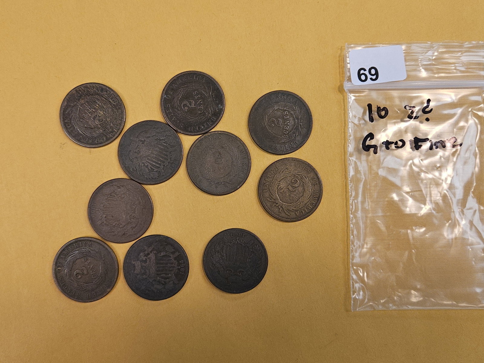 Ten mixed 2-Cent pieces: All in Good to Fine condition