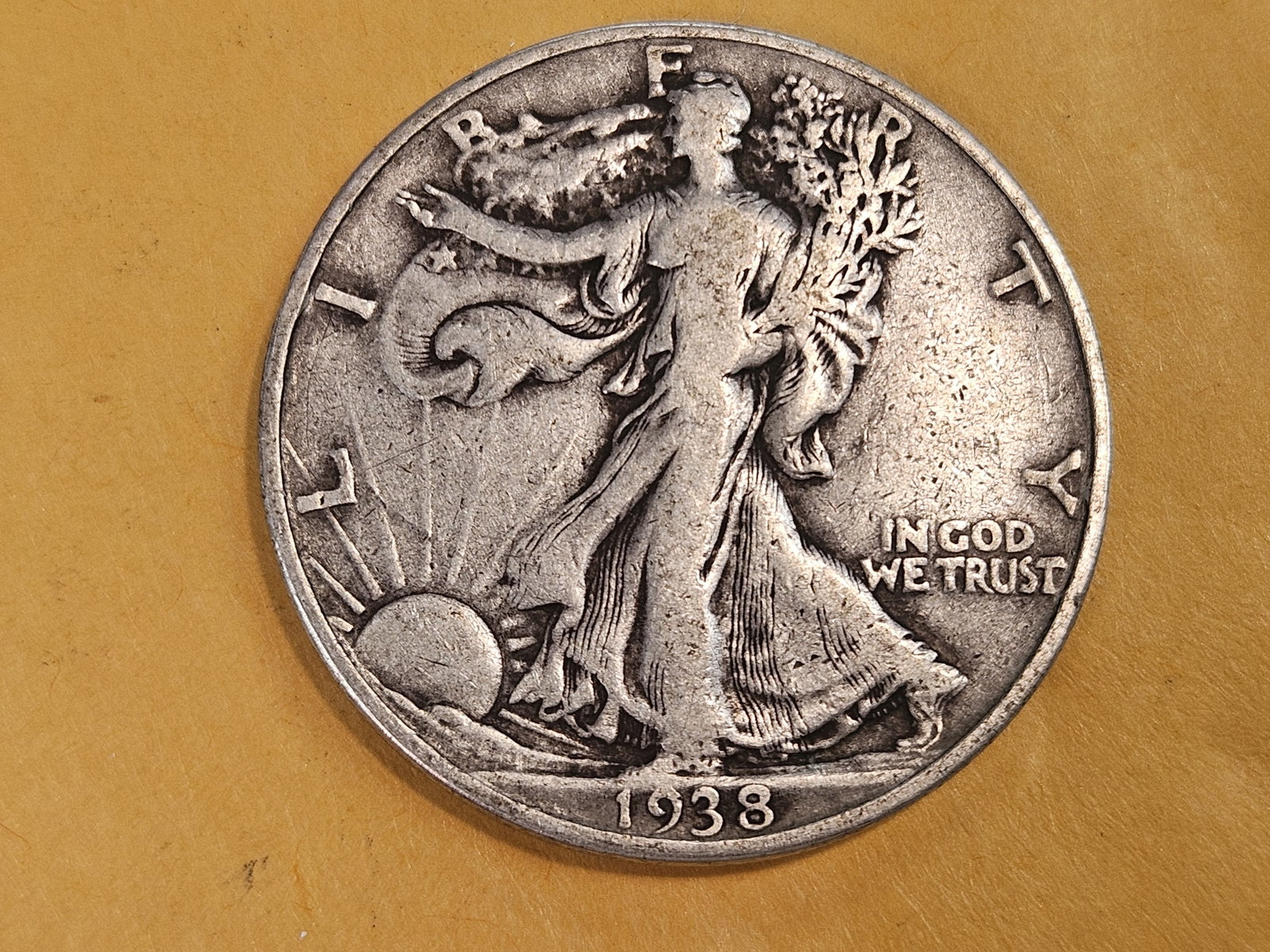 KEY DATE 1938-D Walking Liberty Half Dollar: In Fine