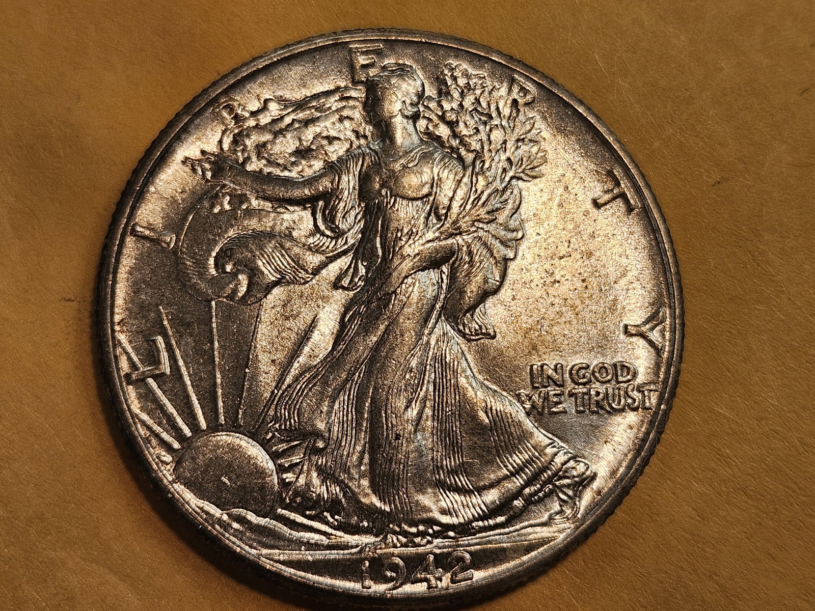 Choice Brilliant Uncirculated 1942 Walking Liberty Half Dollar: Great luster