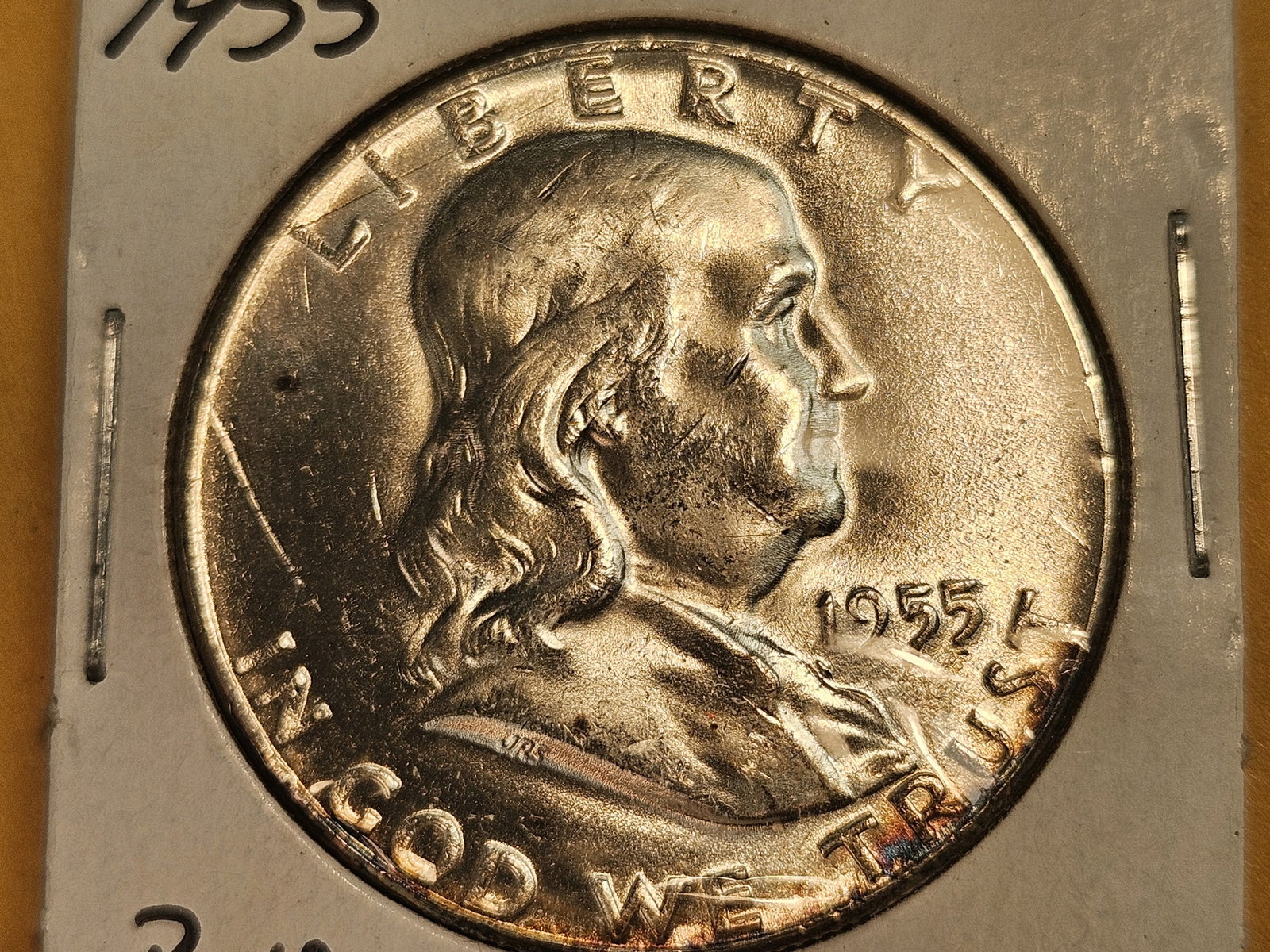 Choice Brilliant Uncirculated 1955 Franklin Half Dollar: Lightly toned