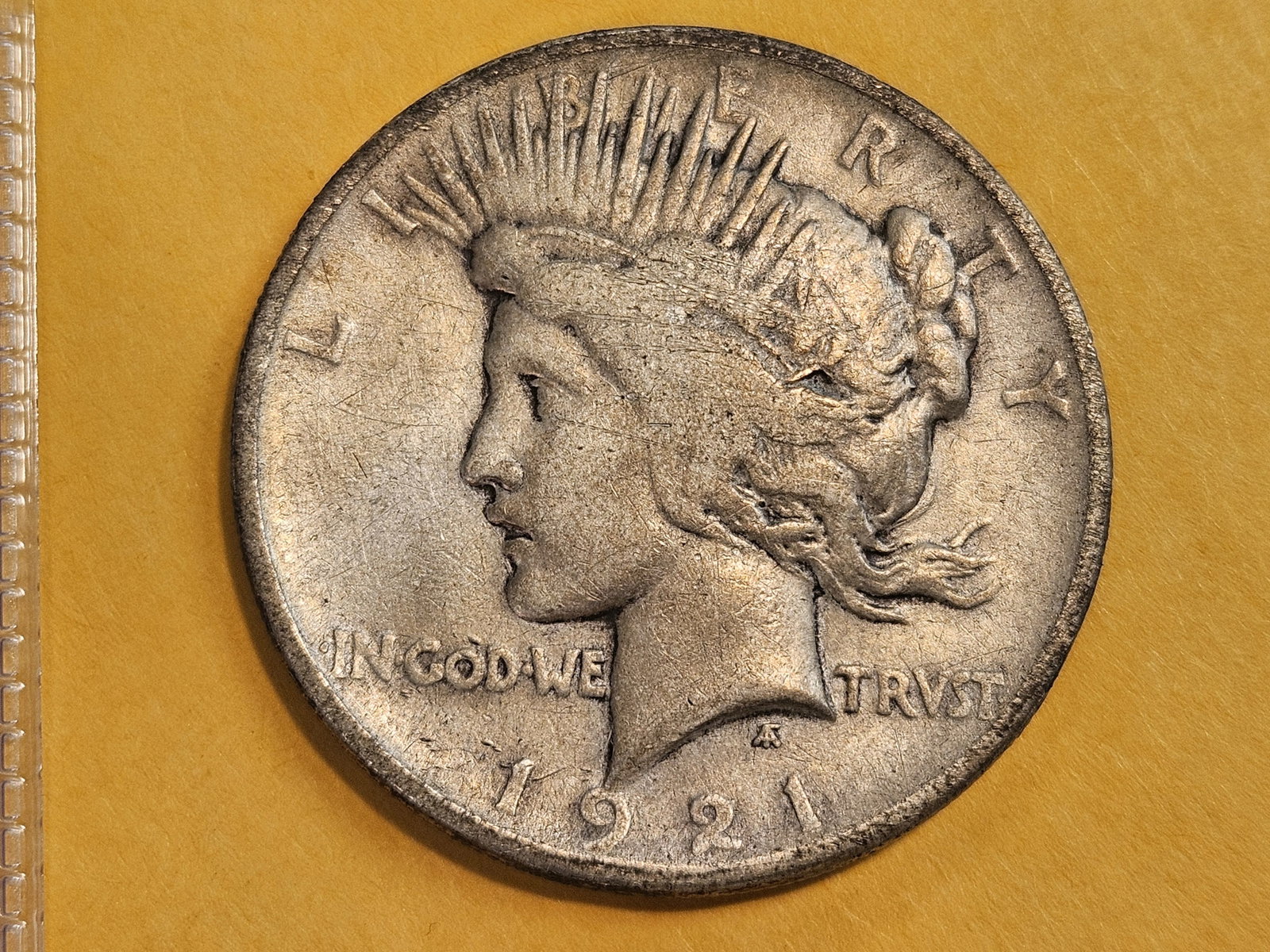 ** KEY DATE ** 1921 Peace Silver Dollar in Very Fine: First Year Issue. High Relief