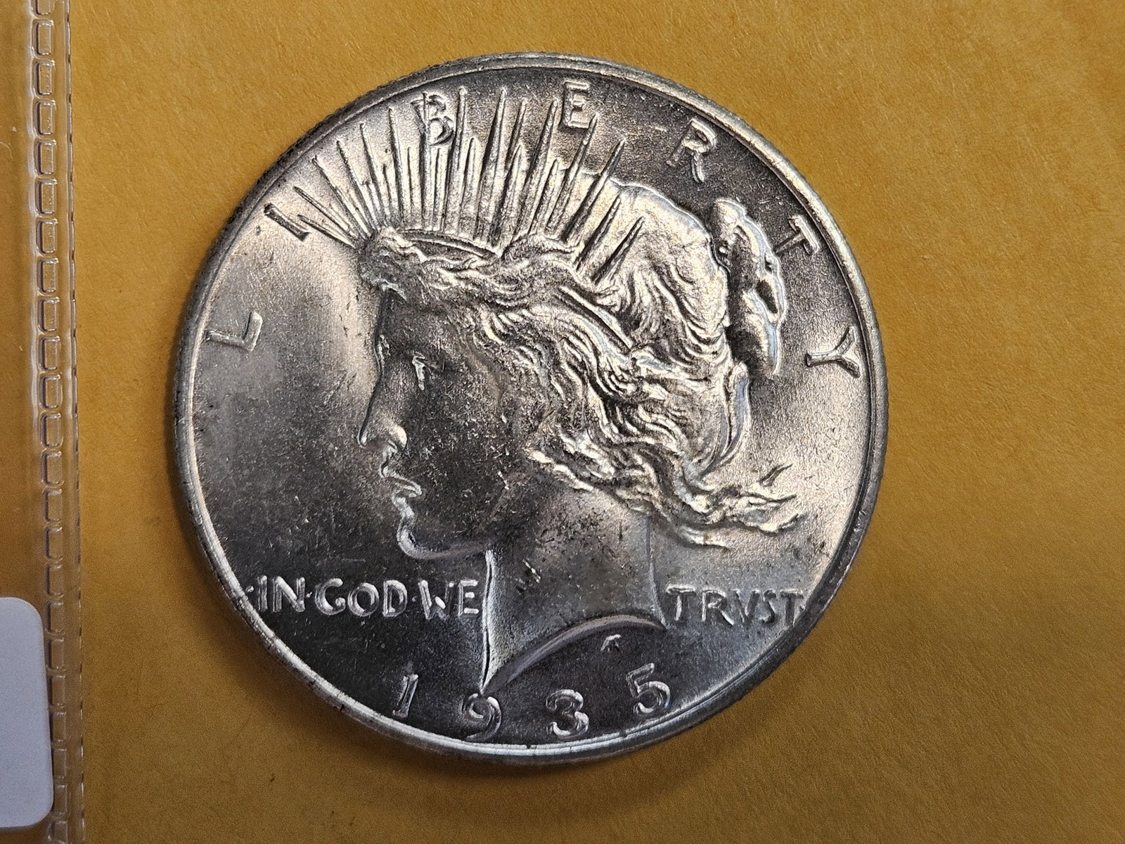 * Choice Brilliant Uncirculated plus 1935 Peace Silver Dollar: Fully lustrous! Great contrast!