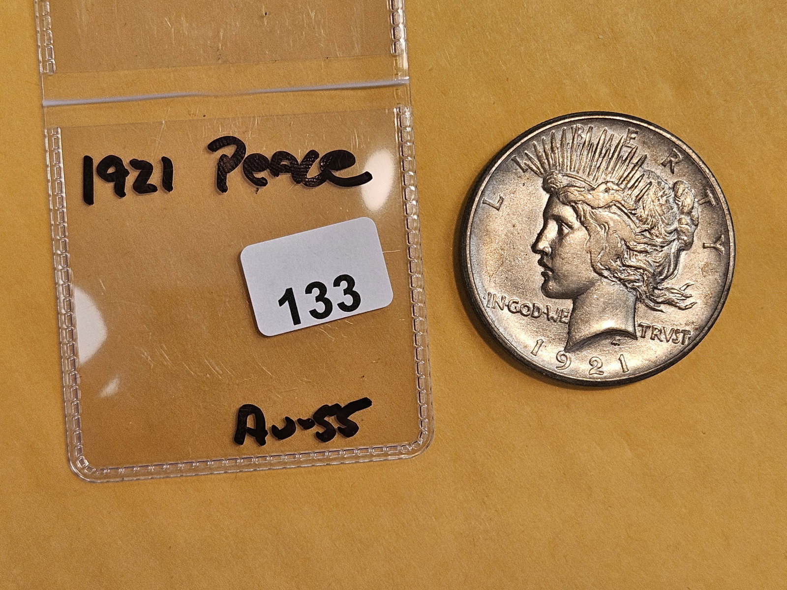 ** KEY DATE ** 1921 Peace Silver Dollar in About Uncirculated - 55 - 2