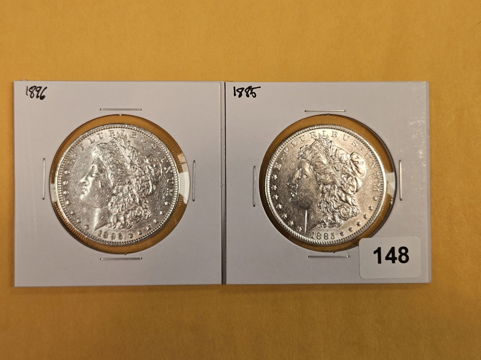 Two About Uncirculatd Morgan silver Dollars: Mixed.