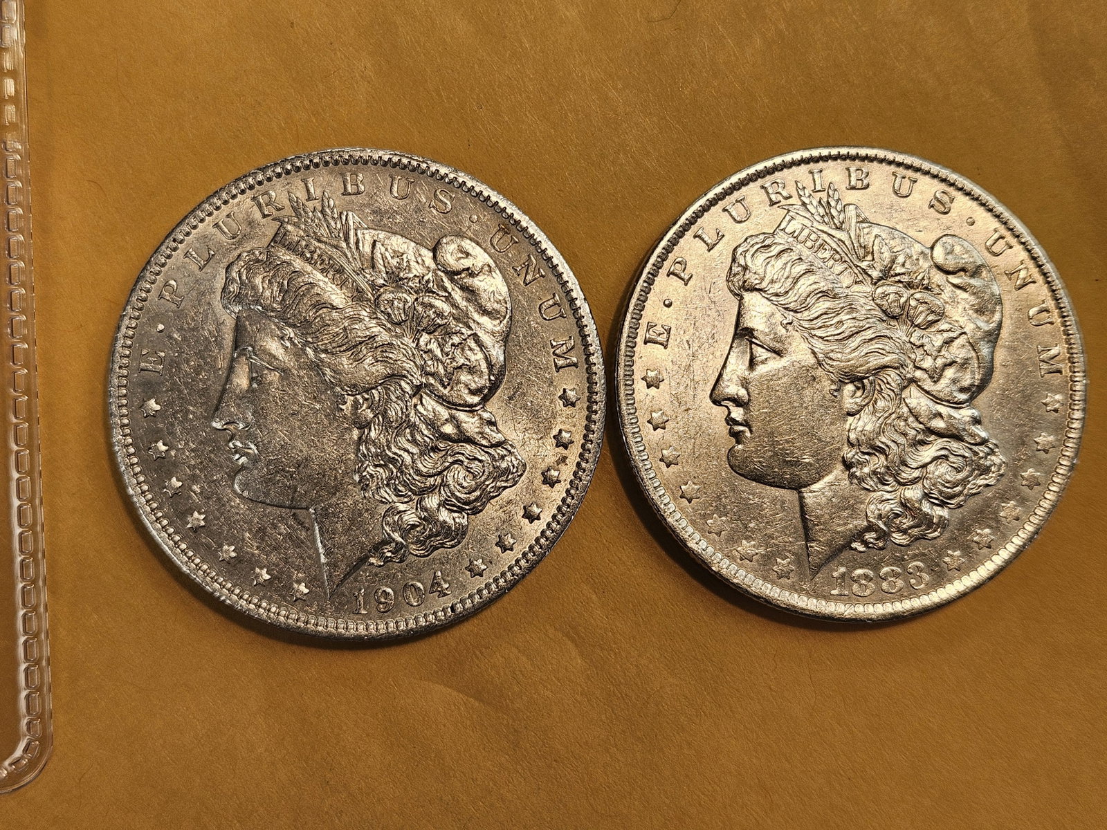 Two Brilliant About Uncirculated plus Morgan Dollars: Mixed