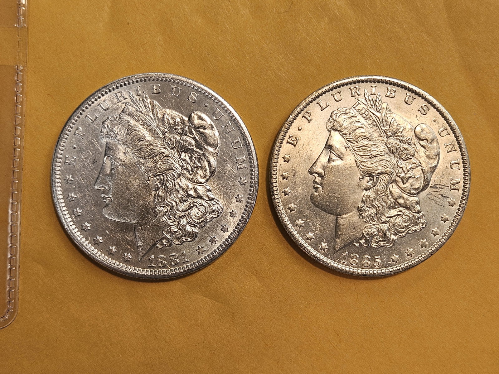 Two Brilliant About Uncirculated plus Morgan Dollars: Mixed