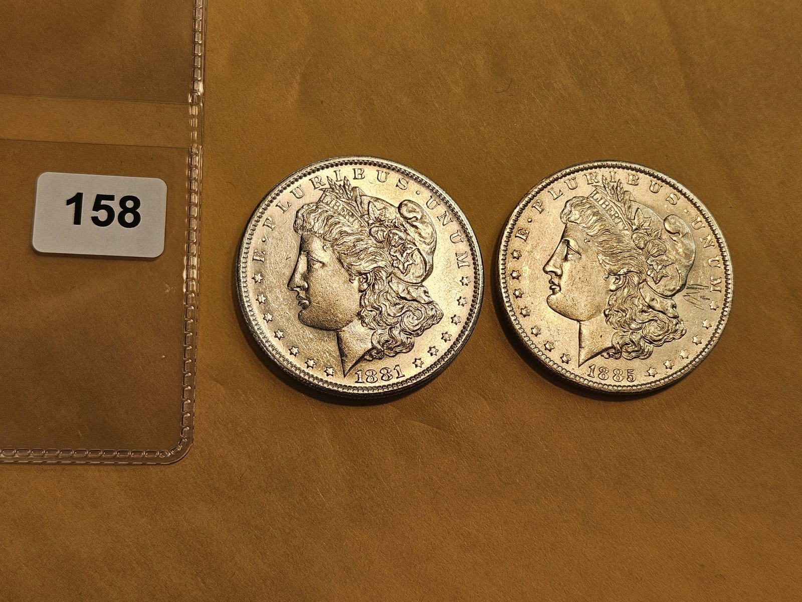 Two Brilliant About Uncirculated plus Morgan Dollars - 2