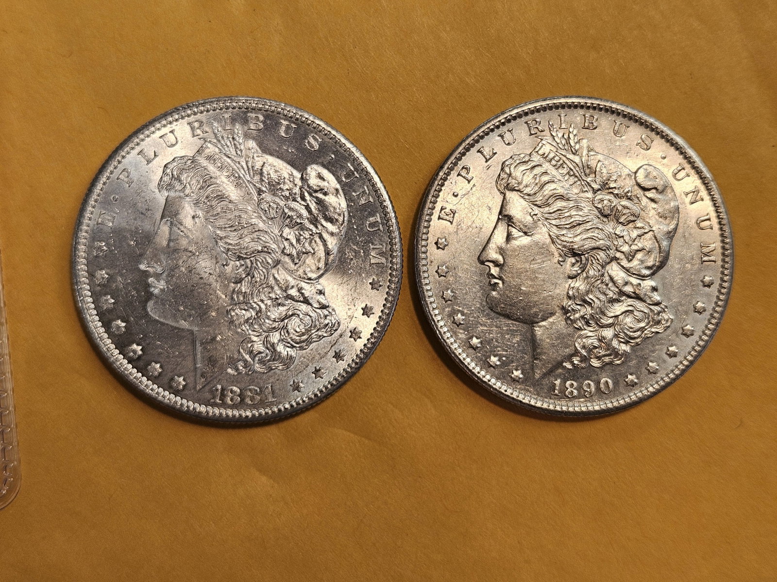 Two Brilliant About Uncirculated plus Morgan Dollars: Mixed