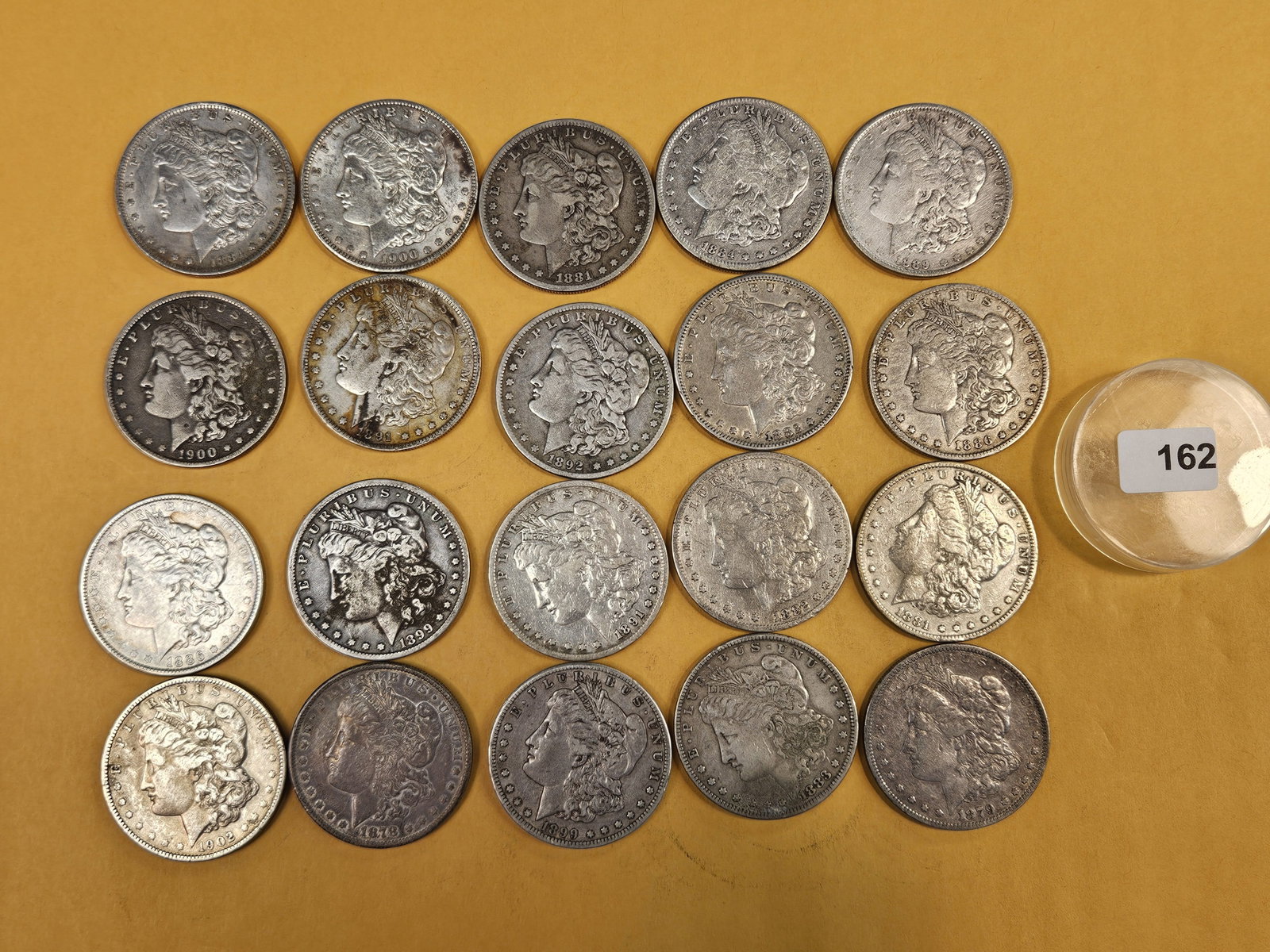 ** FULL ROLL ** Twenty Morgan Silver Dollars: All pre-1904. Grades from Fine through About Uncirculated - details