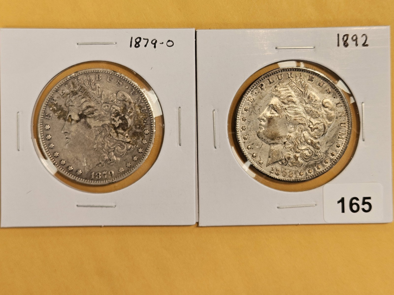 Two Better Date Morgan Silver Dollars: 1879-O and 1892