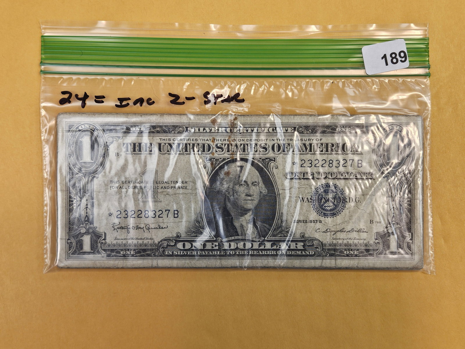 Twenty-Four $1 Silver Certificates: circulated. From Dealer. Unchecked by us. Includes 2 star notes