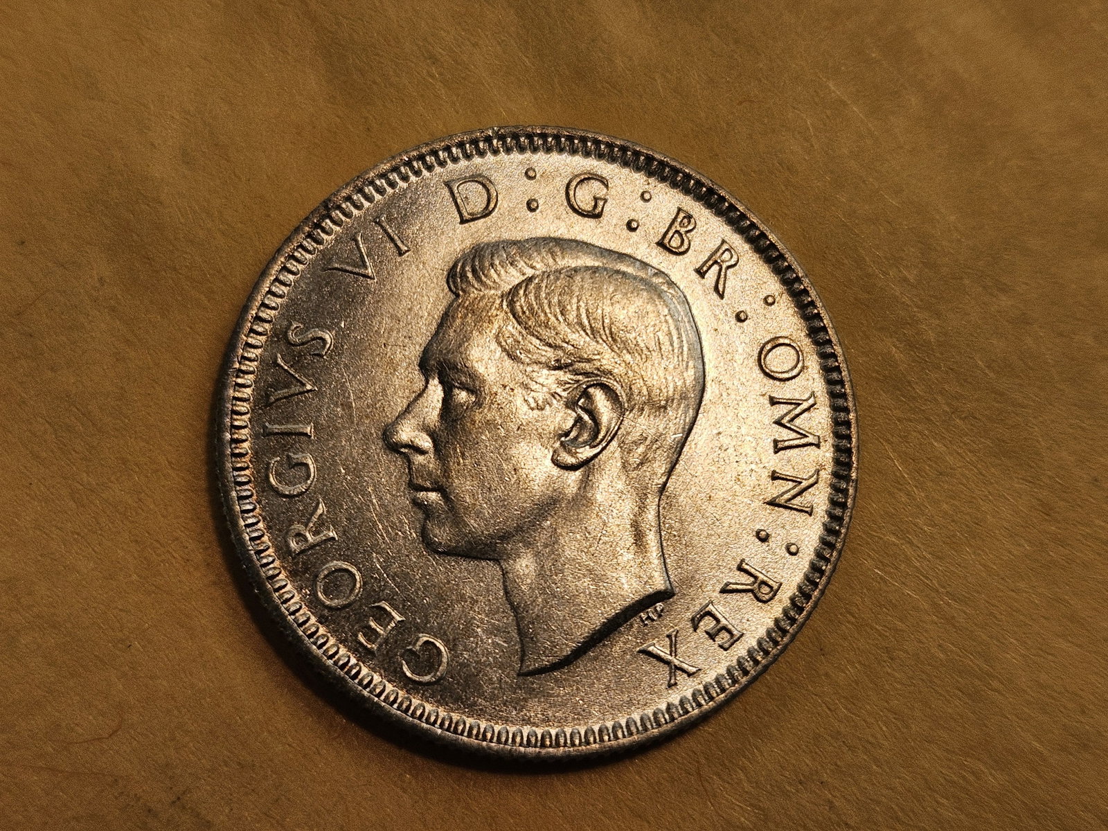 Choice Brilliant Uncirculated 1943 United Kingdom shilling: KM 852