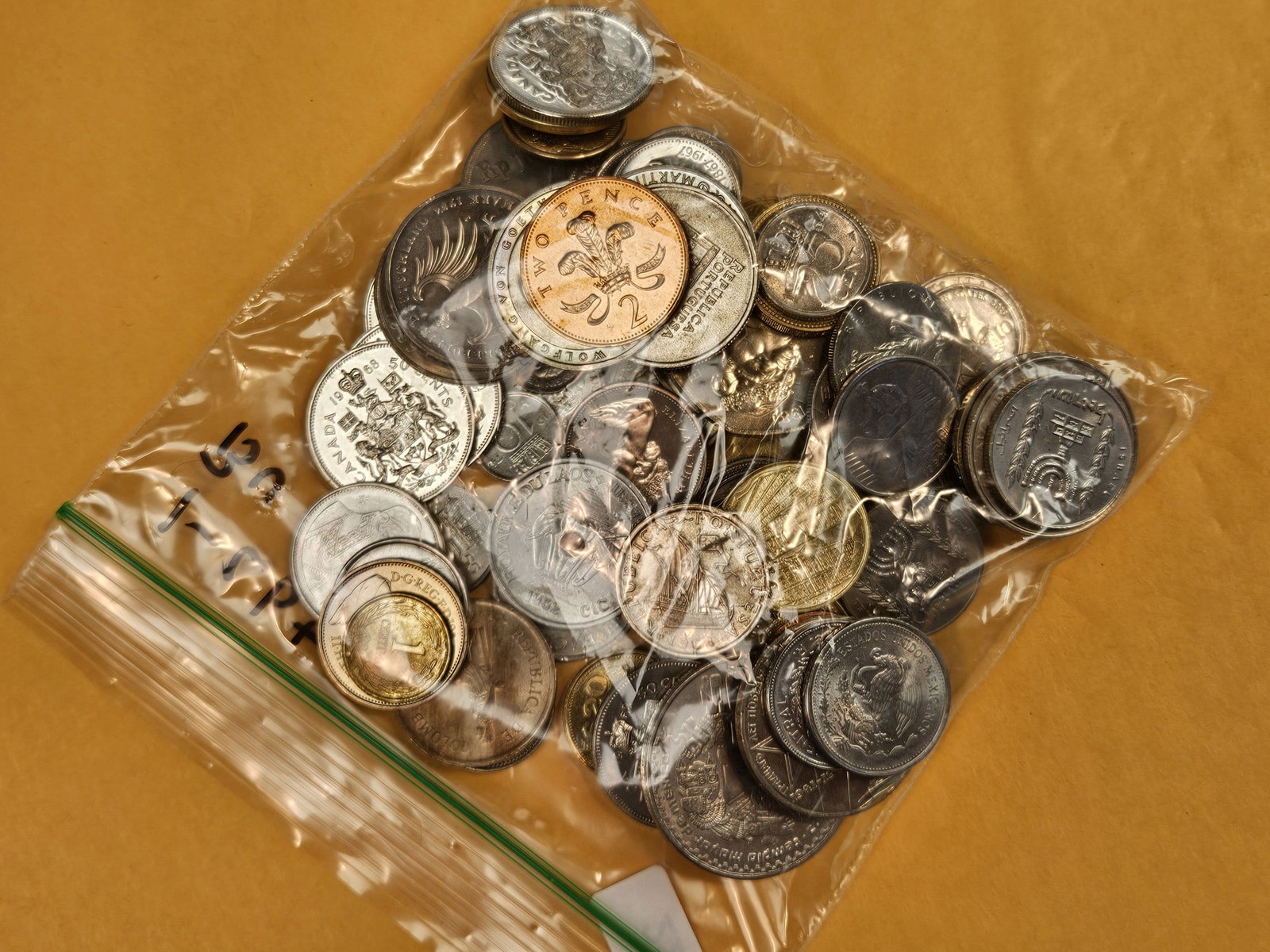 Over 1 Pound of mixed, Uncirculated, World coins - 2