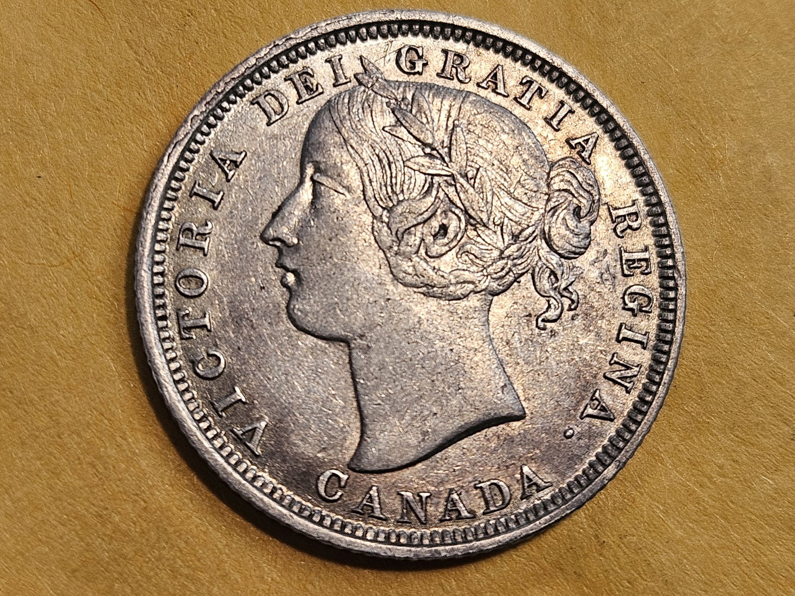 ** KEY DATE ** Bright 1858 Canada Silver 20 Cents in Extra Fine plus: KM 4. Good original luster under the patina. Dealer graded in XF-AU. Scarce in higher grade. Coins & Canada site cataloged it between $354 and $620!
